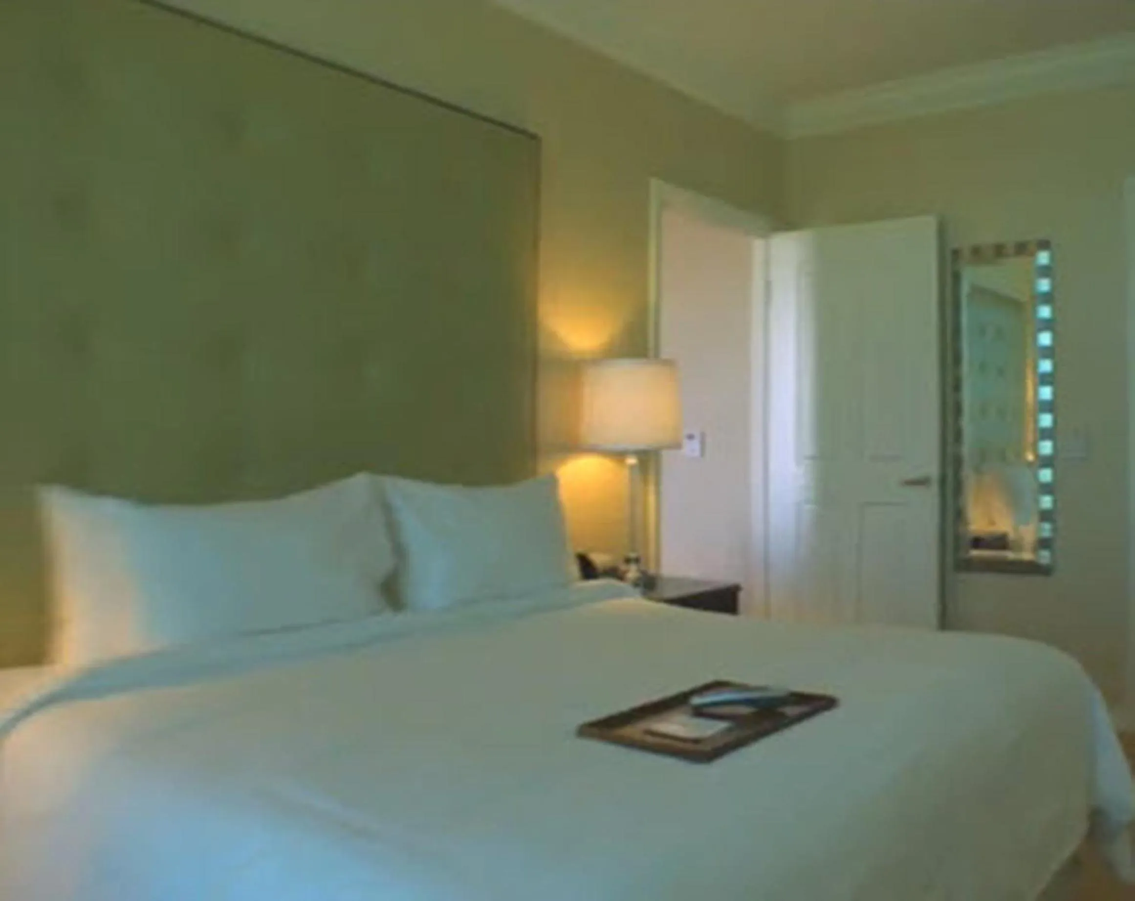 Bed in Jet Luxury at The Signature Condo Hotel