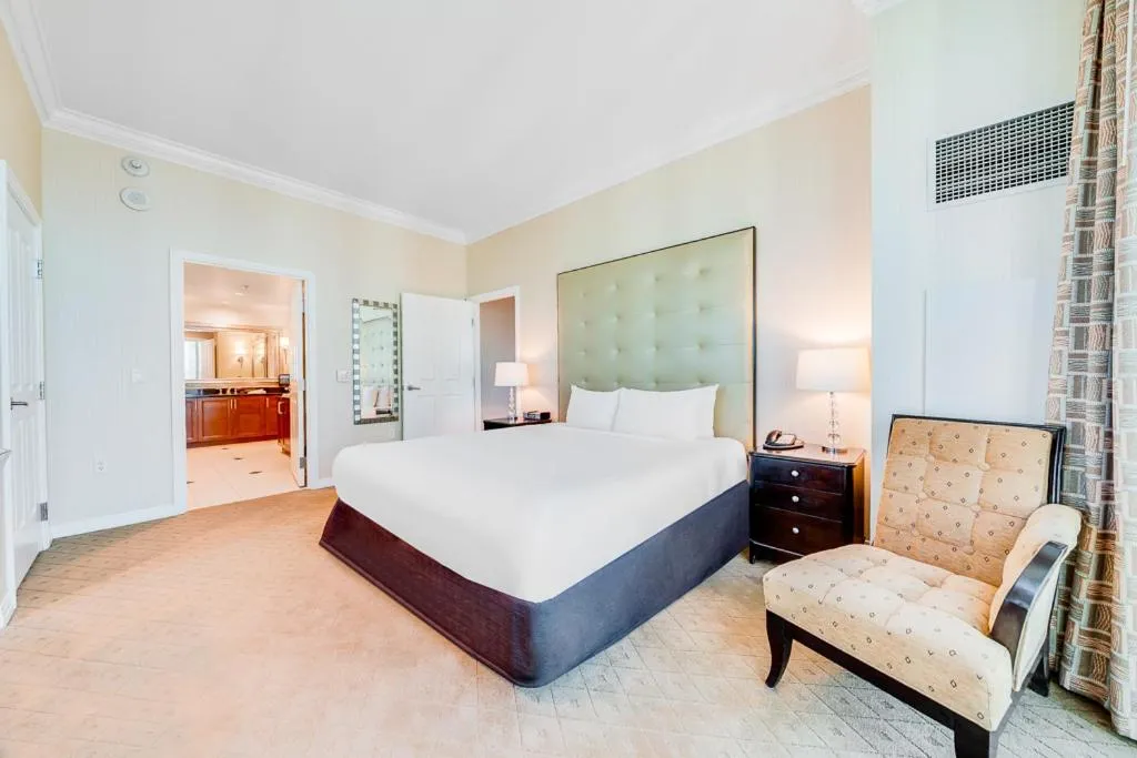 Bed in Jet Luxury at The Signature Condo Hotel