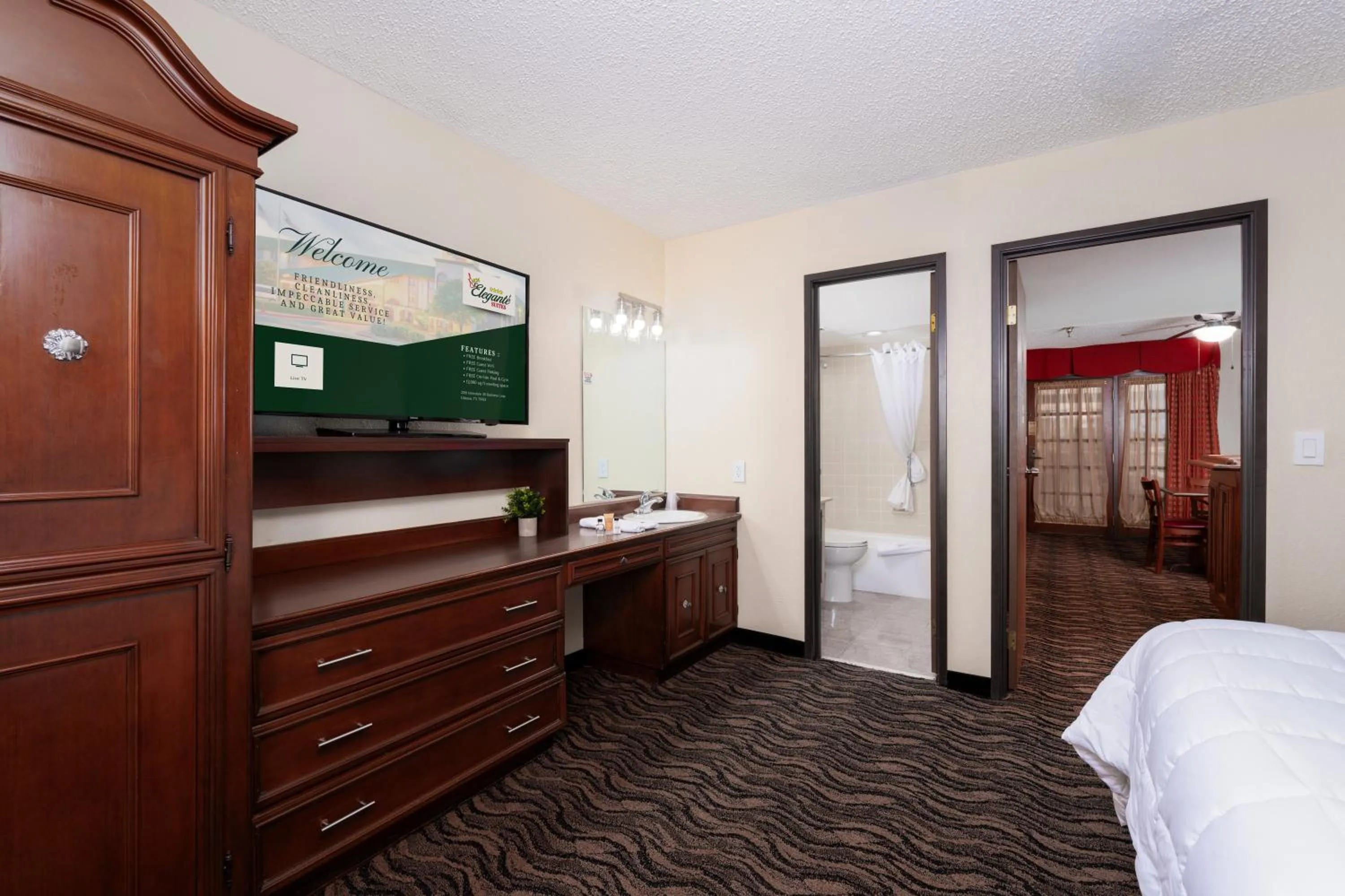 Photo of the whole room, Bed in MCM Elegante Suites Abilene