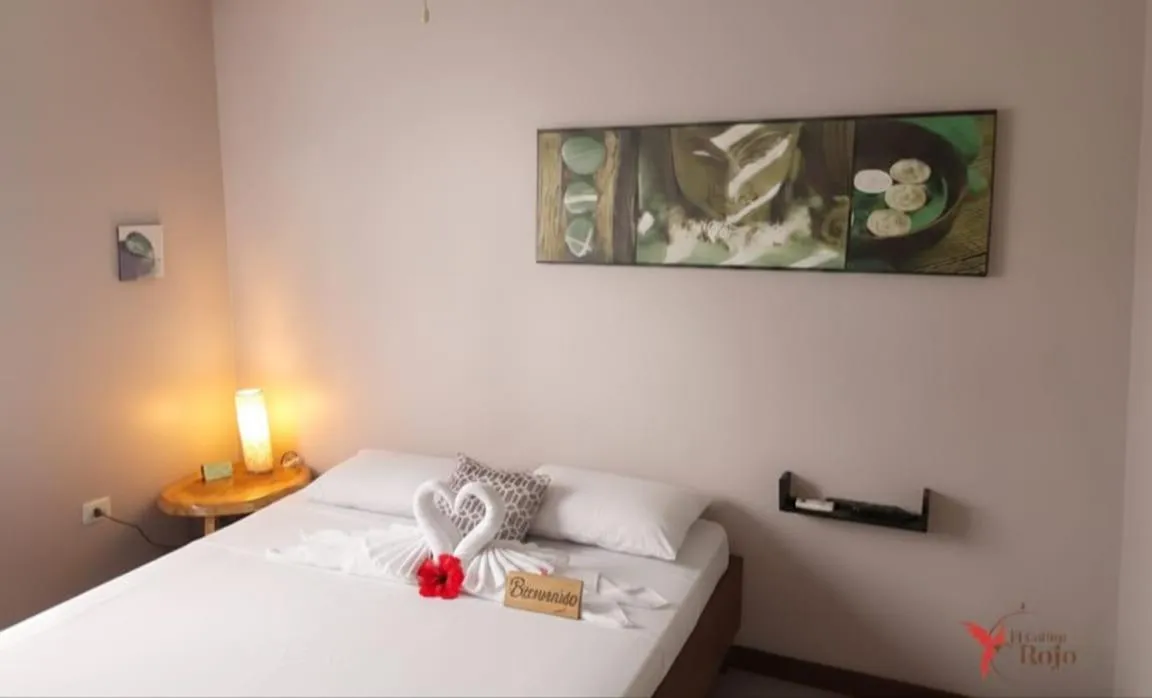 Bed in Hotel El Colibri Rojo