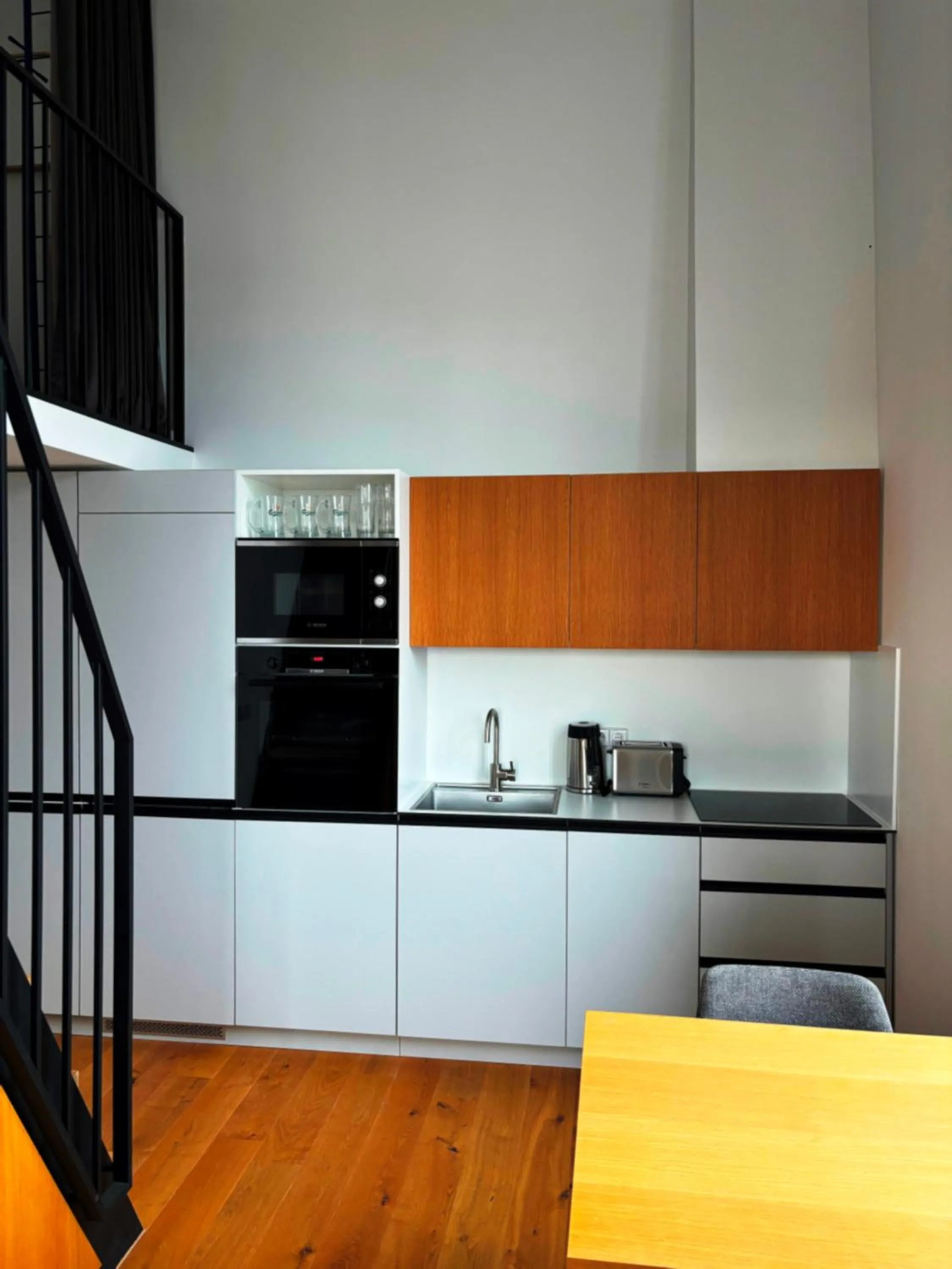 Kitchen or kitchenette in KaunasInn - AM