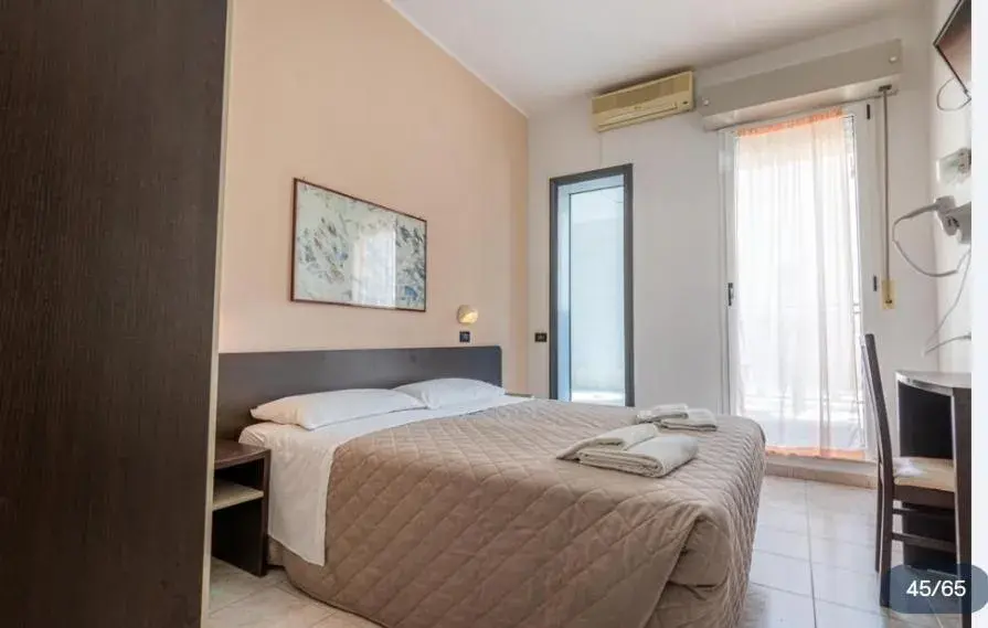 Bed in Hotel Villa Dina Bed in Hotel Villa Dina