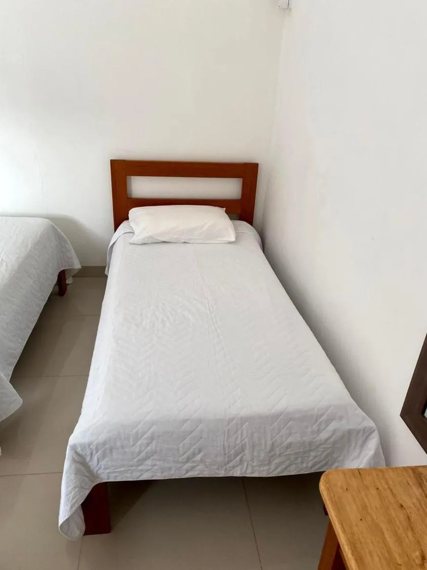 Bed in POUSADA ECOALTER
