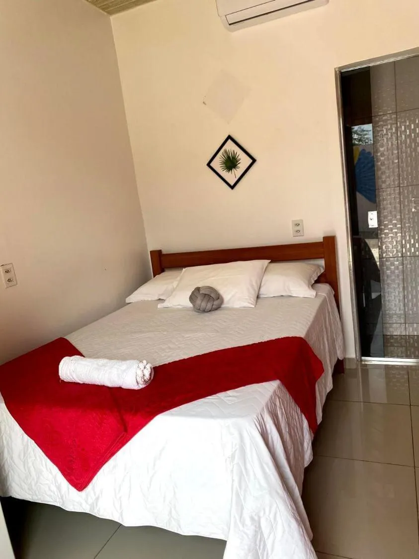Bed in POUSADA ECOALTER