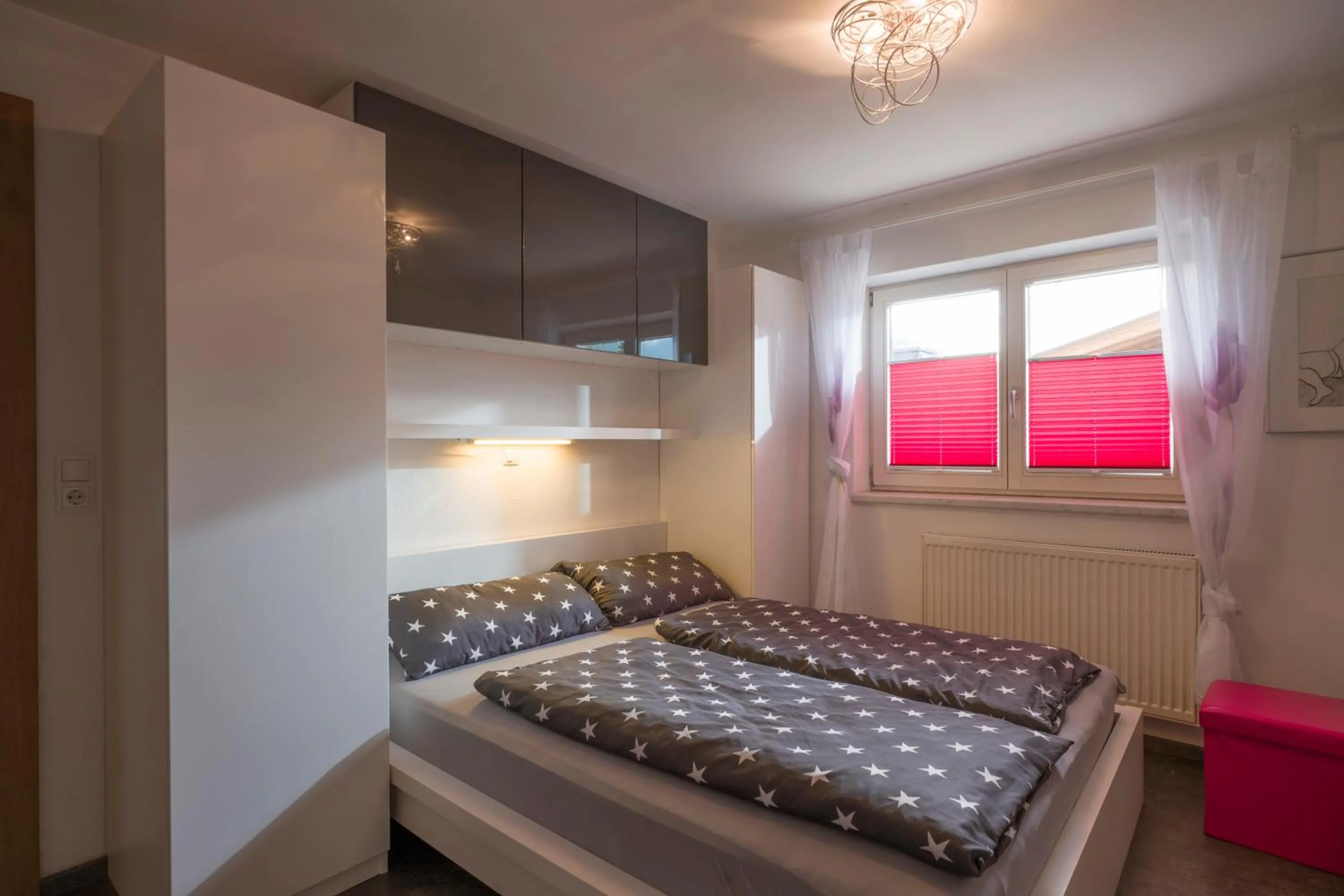 Bed in Hauser's Ferienwohnungen