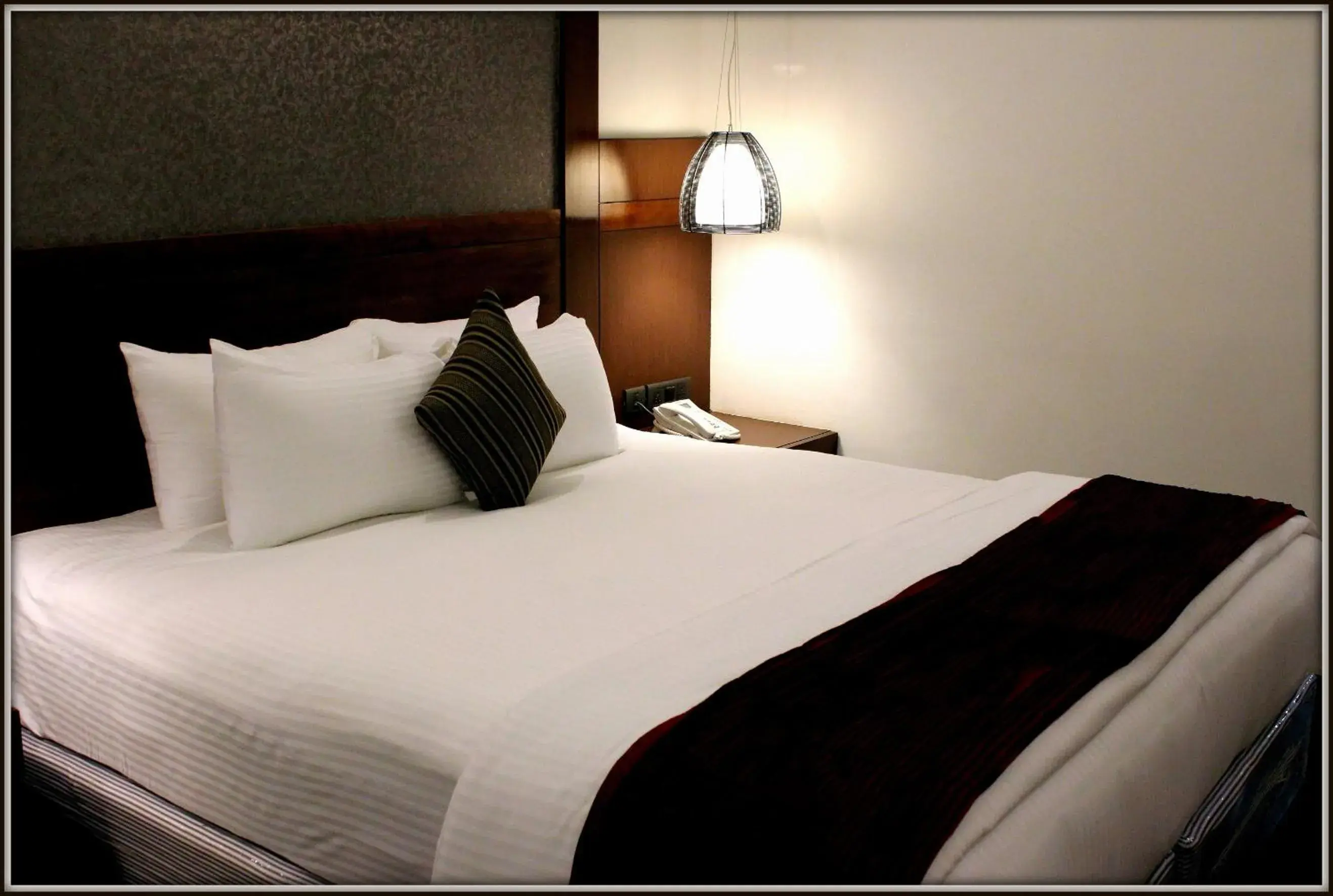 Bedroom in The Cunningham Hotel Bangalore Bedroom in The Cunningham Hotel Bangalore