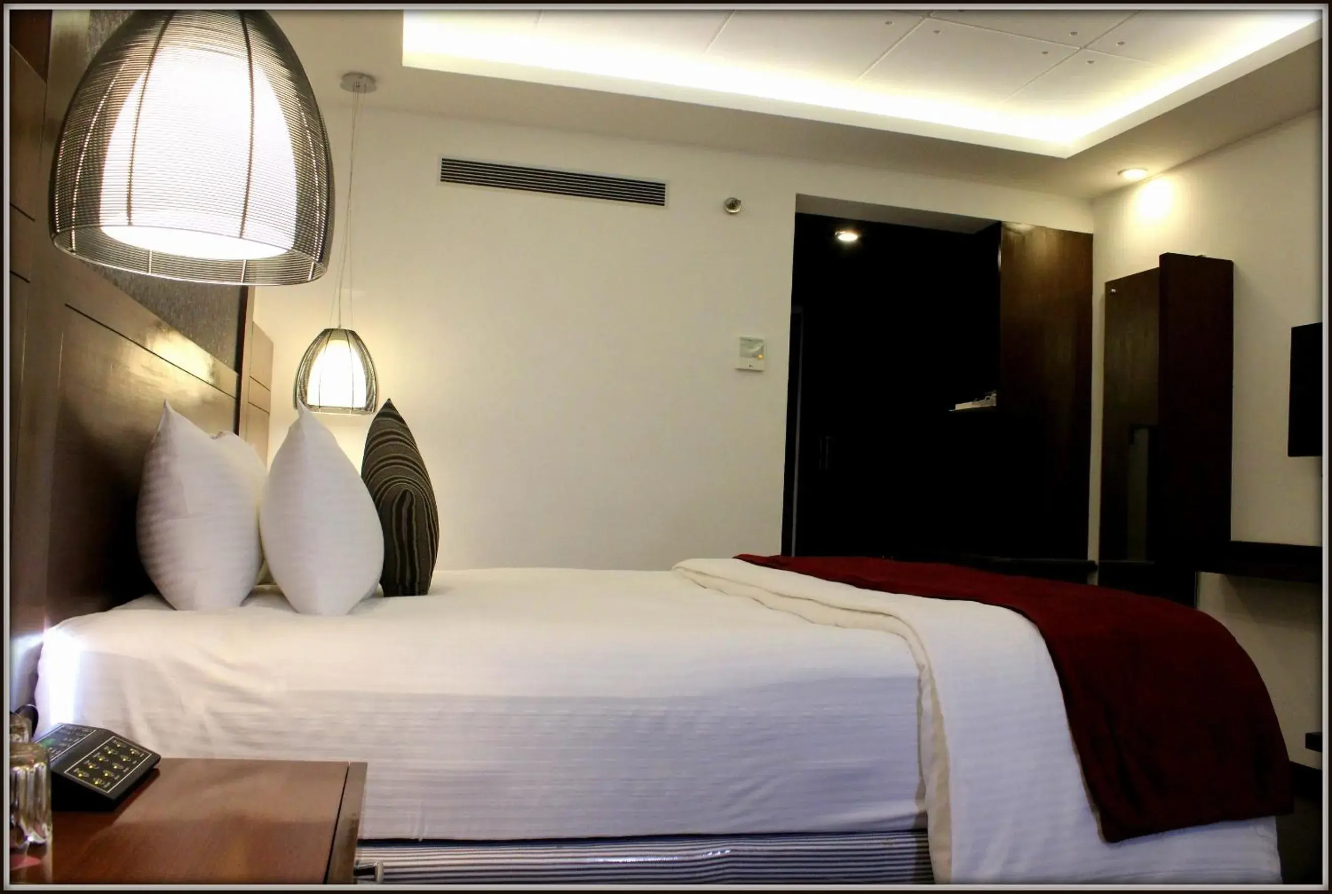 Bed in The Cunningham Hotel Bangalore Bed in The Cunningham Hotel Bangalore