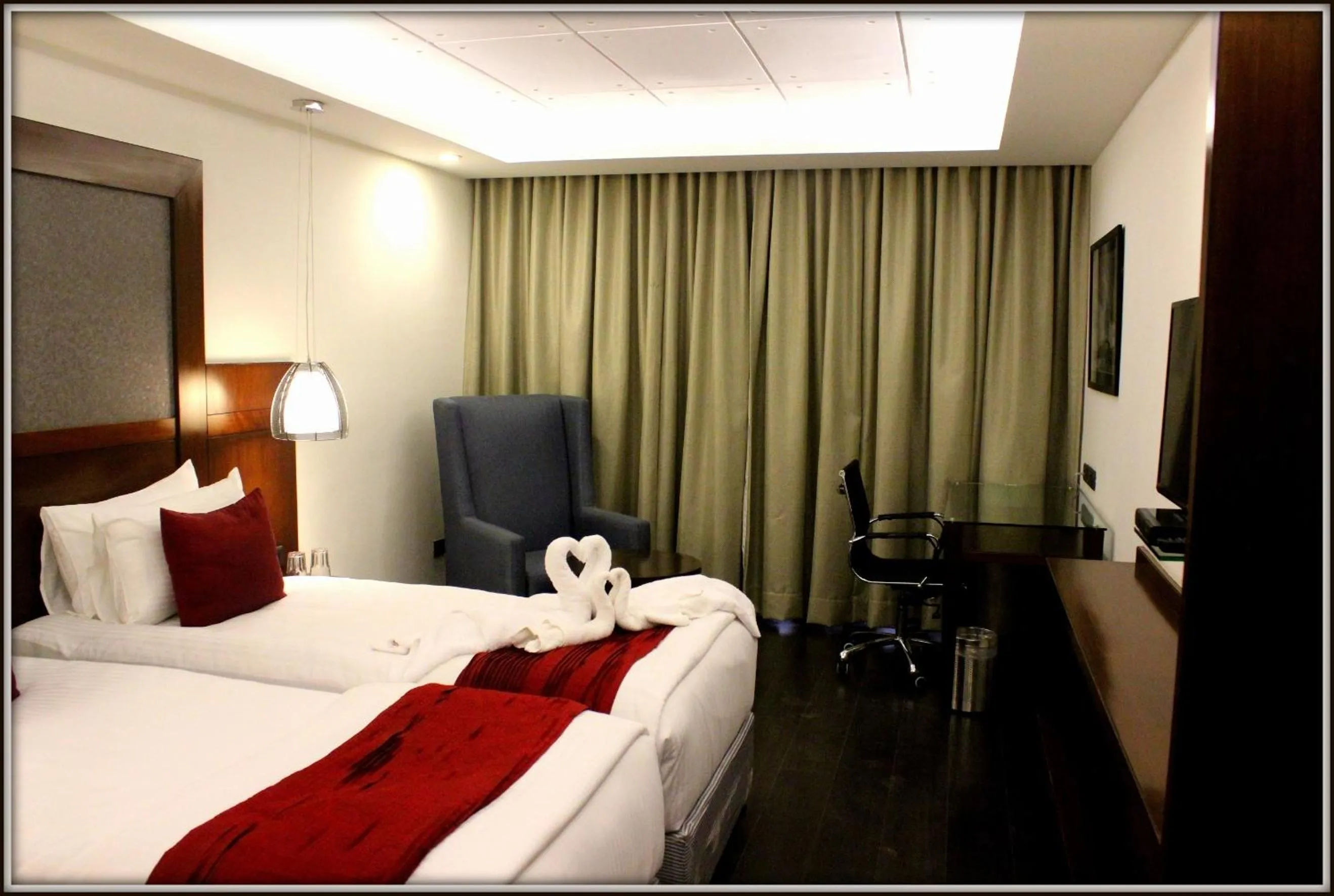 Bedroom in The Cunningham Hotel Bangalore