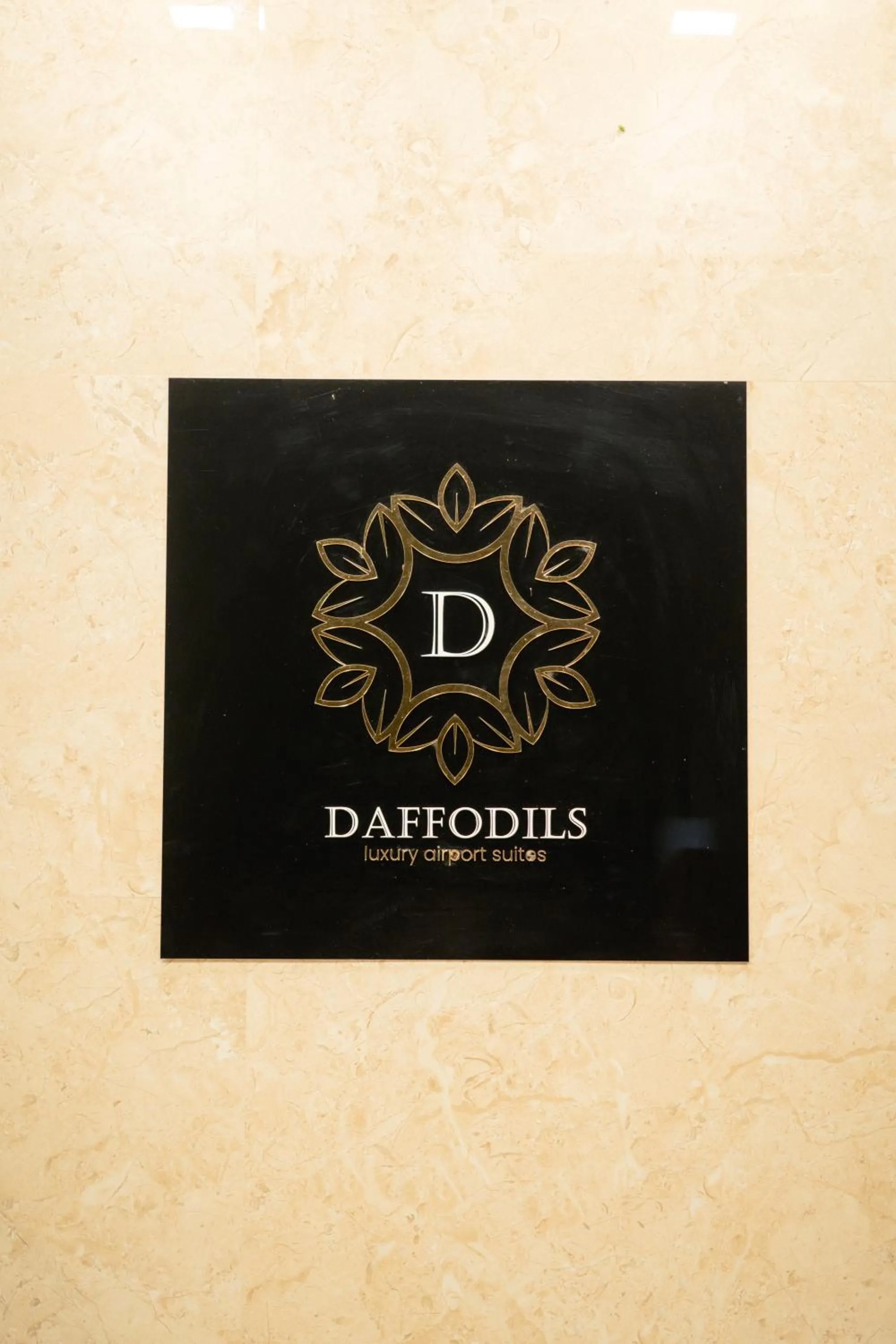 Logo/Certificate/Sign in Daffodils Luxury Airport Suites