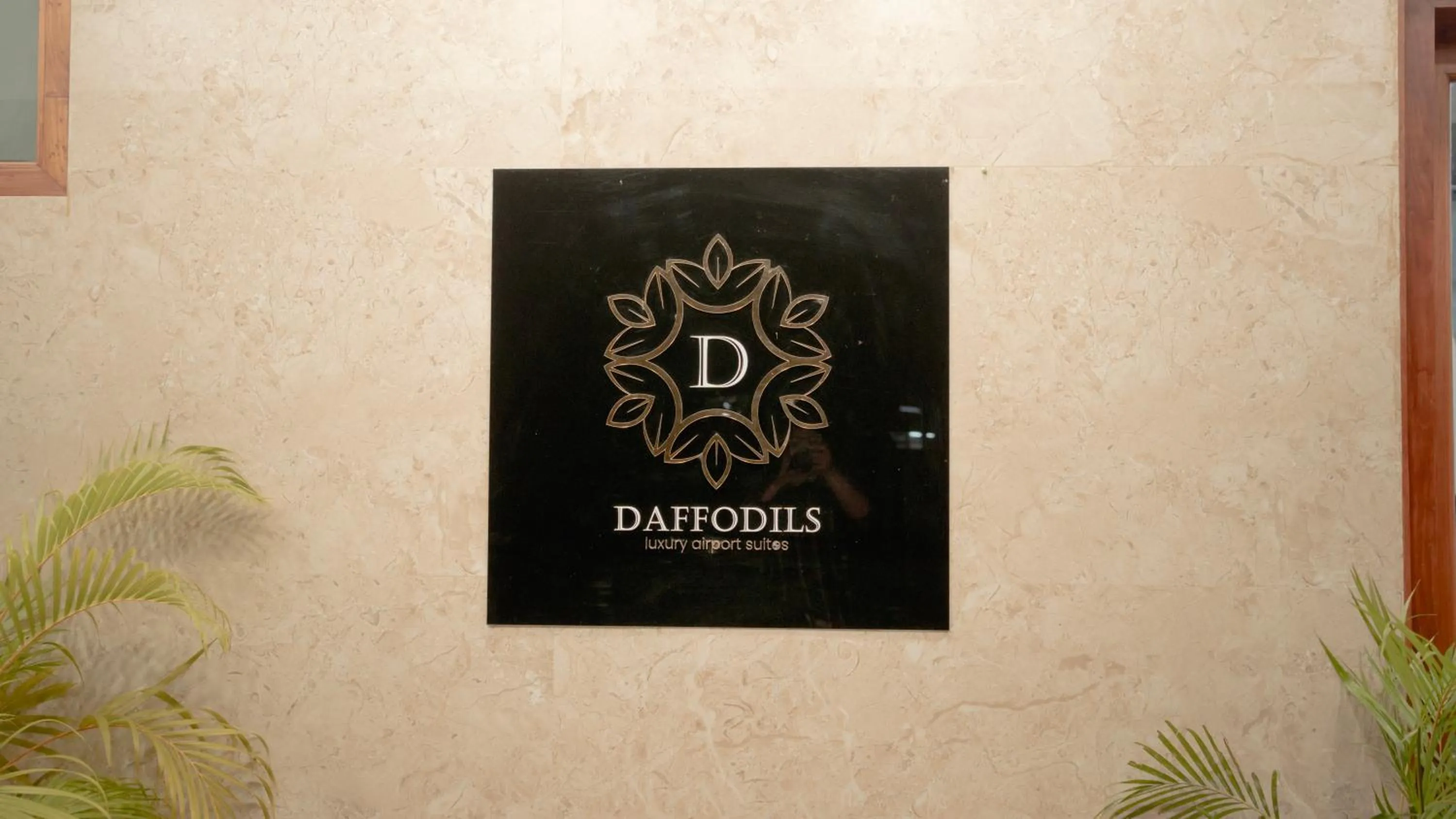 Property logo or sign in Daffodils Luxury Airport Suites