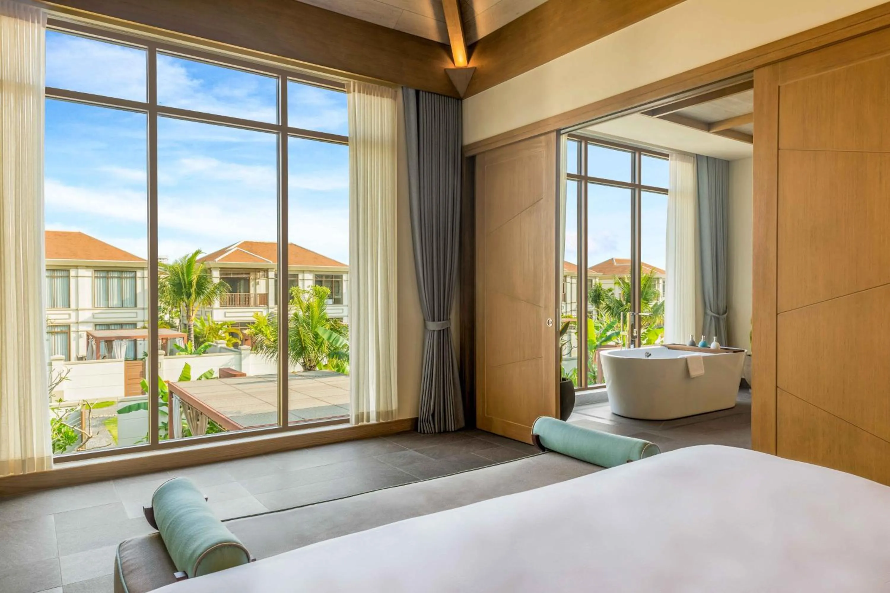 Bed in Fusion Resort and Villas Da Nang