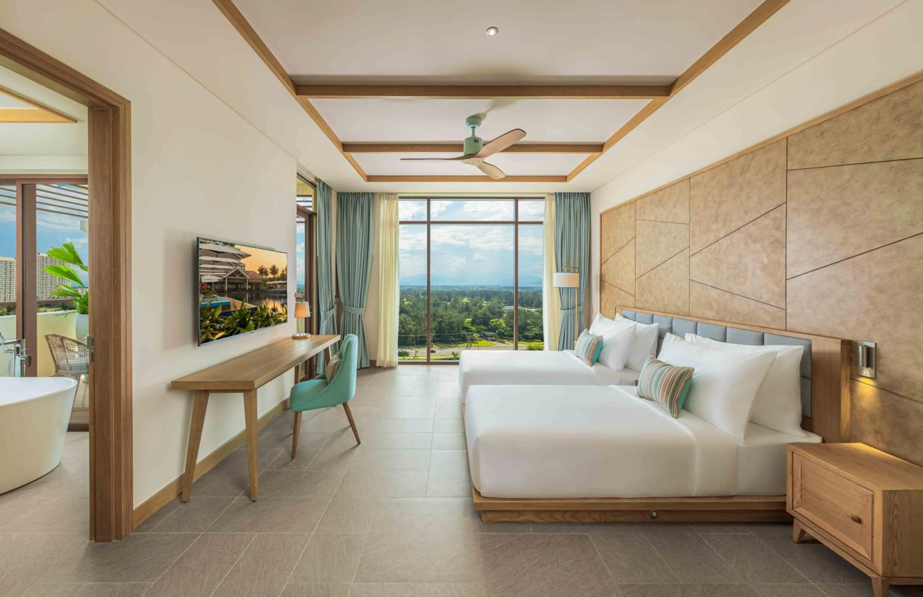 Bed in Fusion Resort and Villas Da Nang