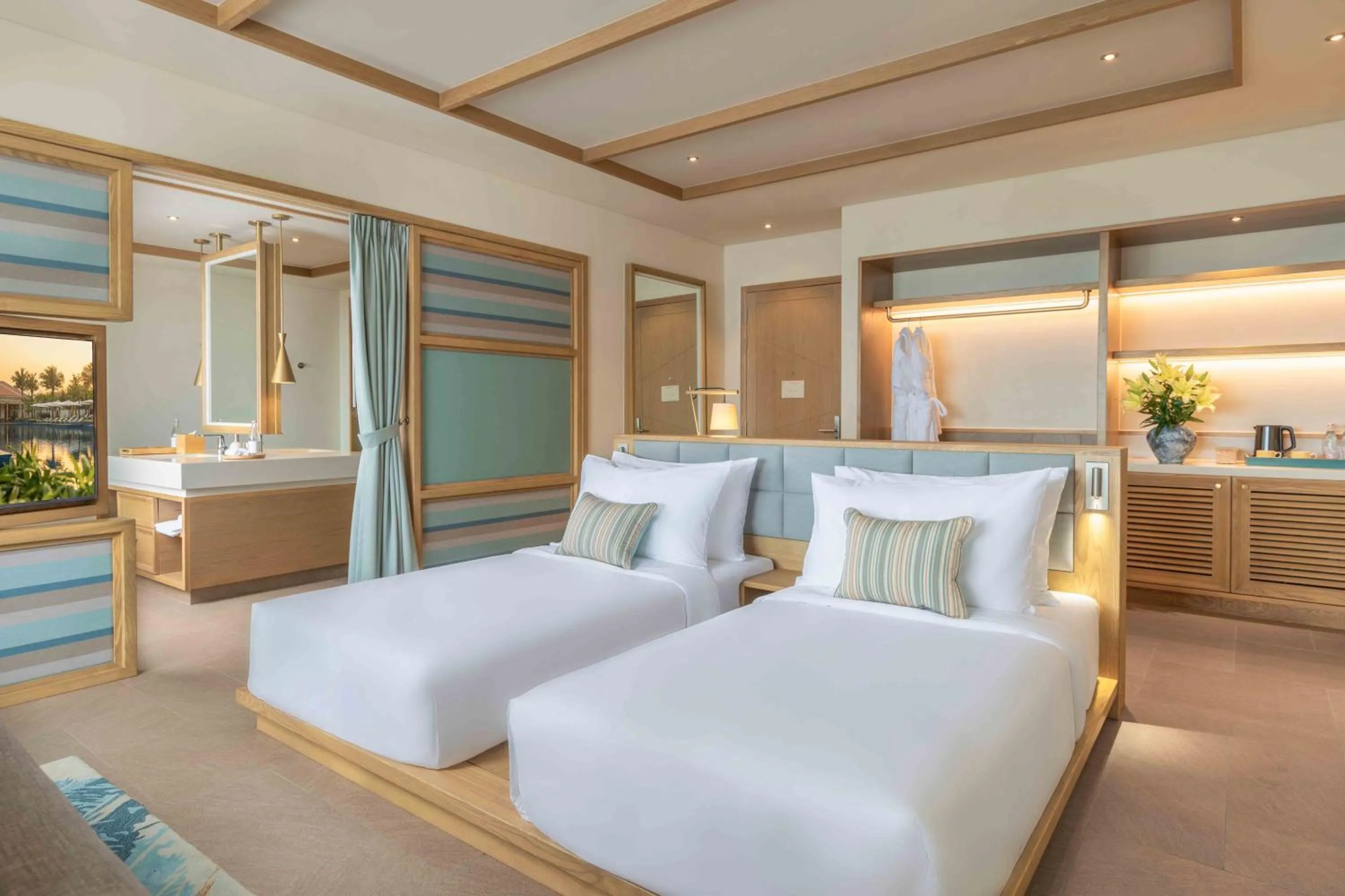 Bed in Fusion Resort and Villas Da Nang