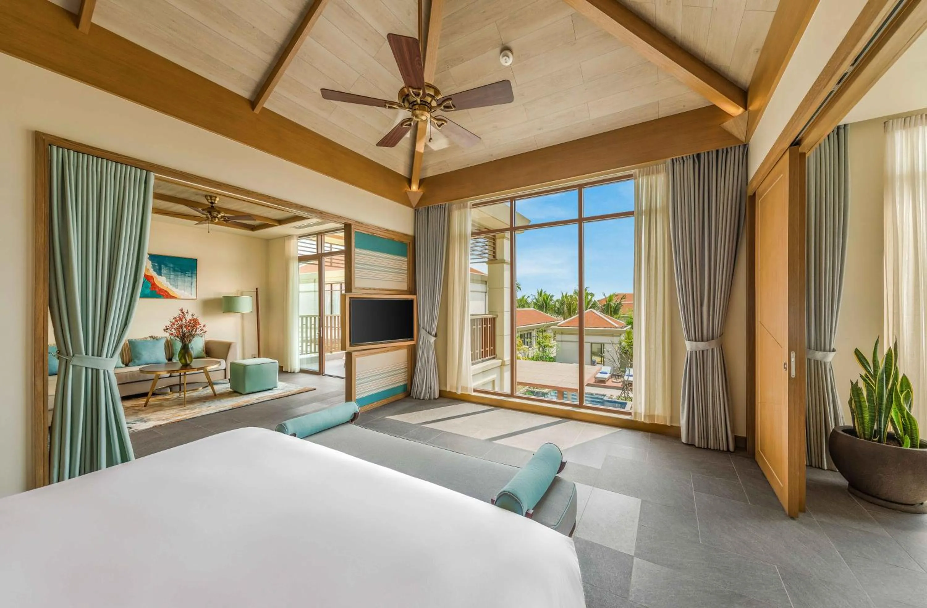 Bed in Fusion Resort and Villas Da Nang