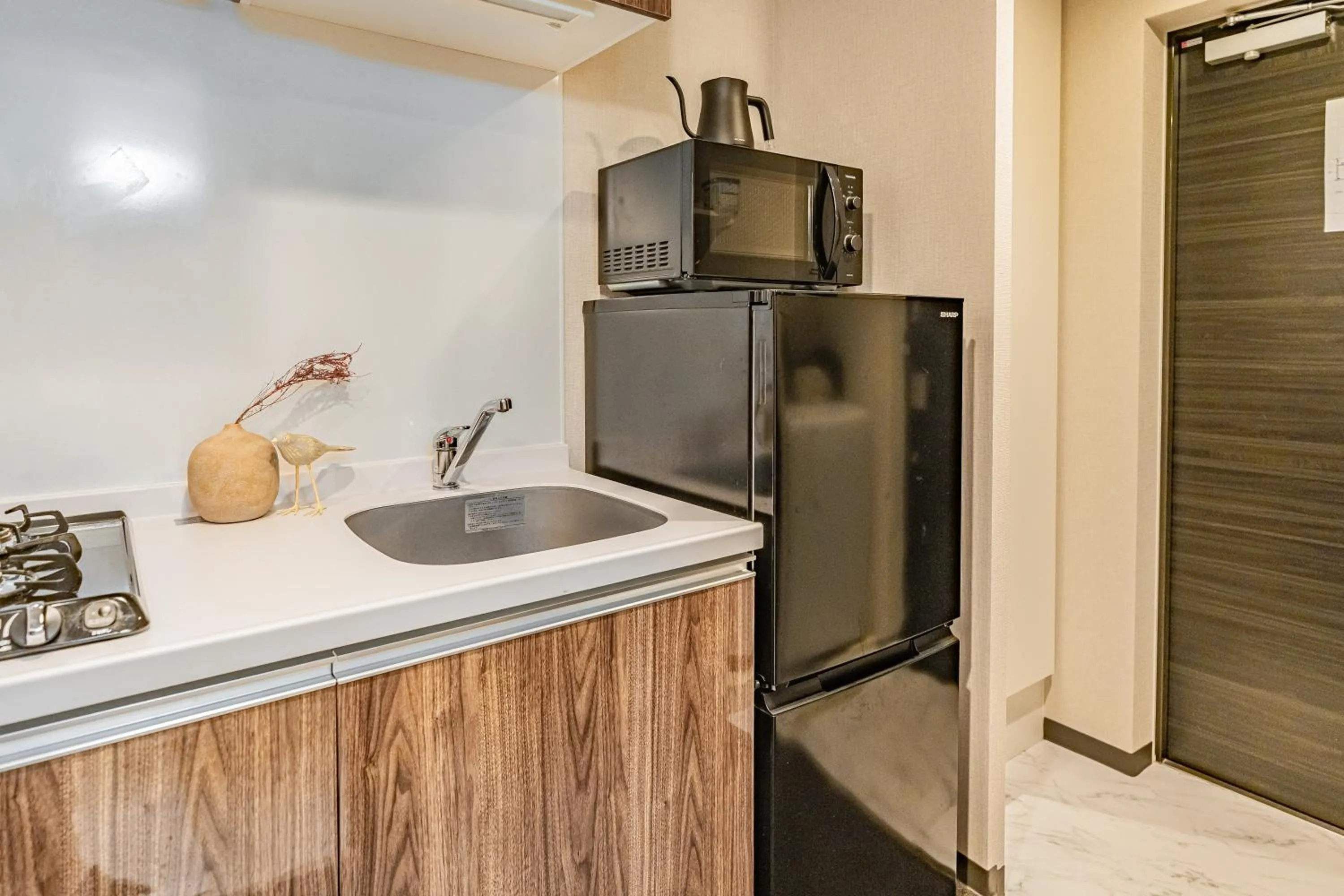 Kitchen or kitchenette in Apartment Hotel 11 Kuromon 2