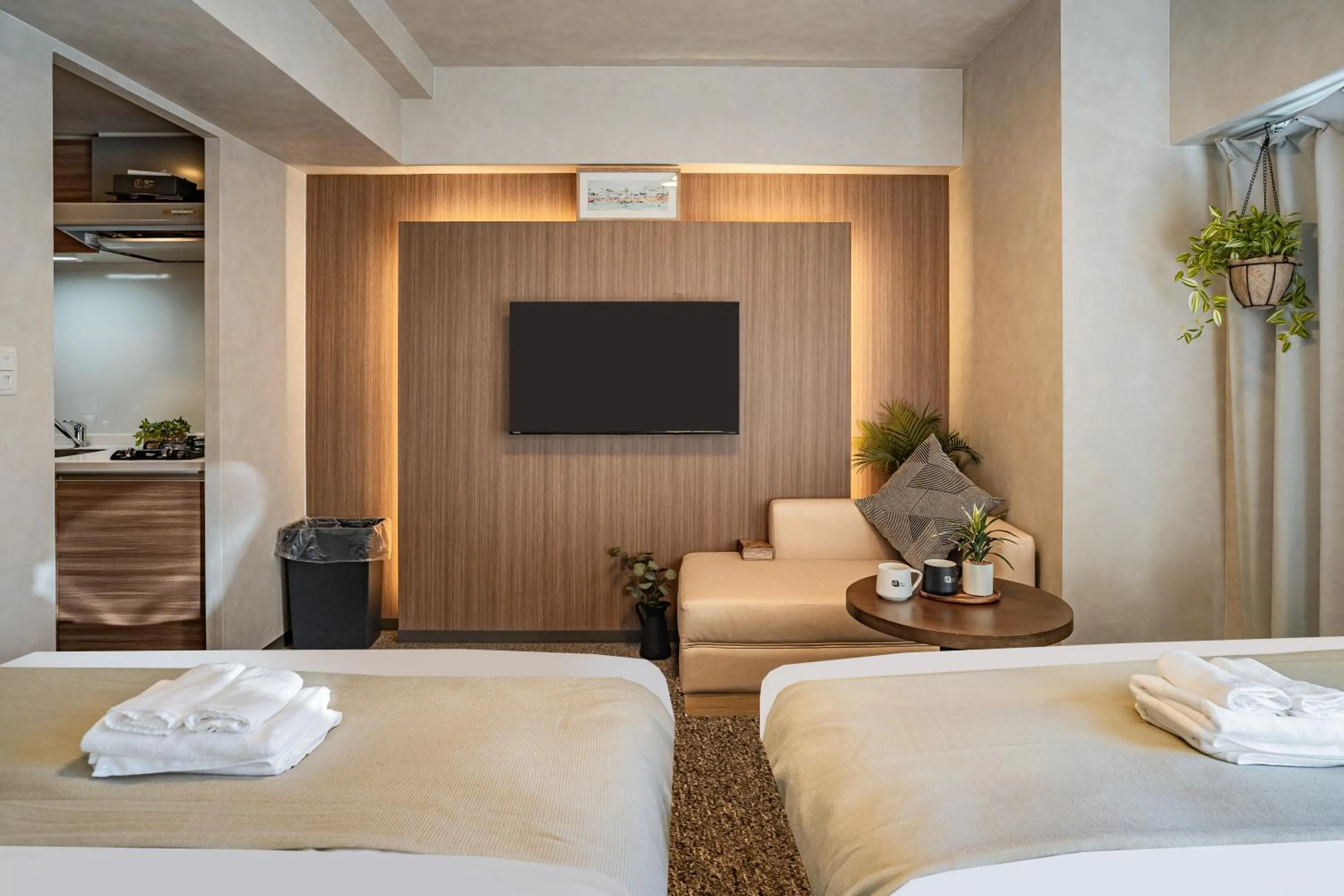Communal lounge/ TV room, Bed in Apartment Hotel 11 Kuromon 2