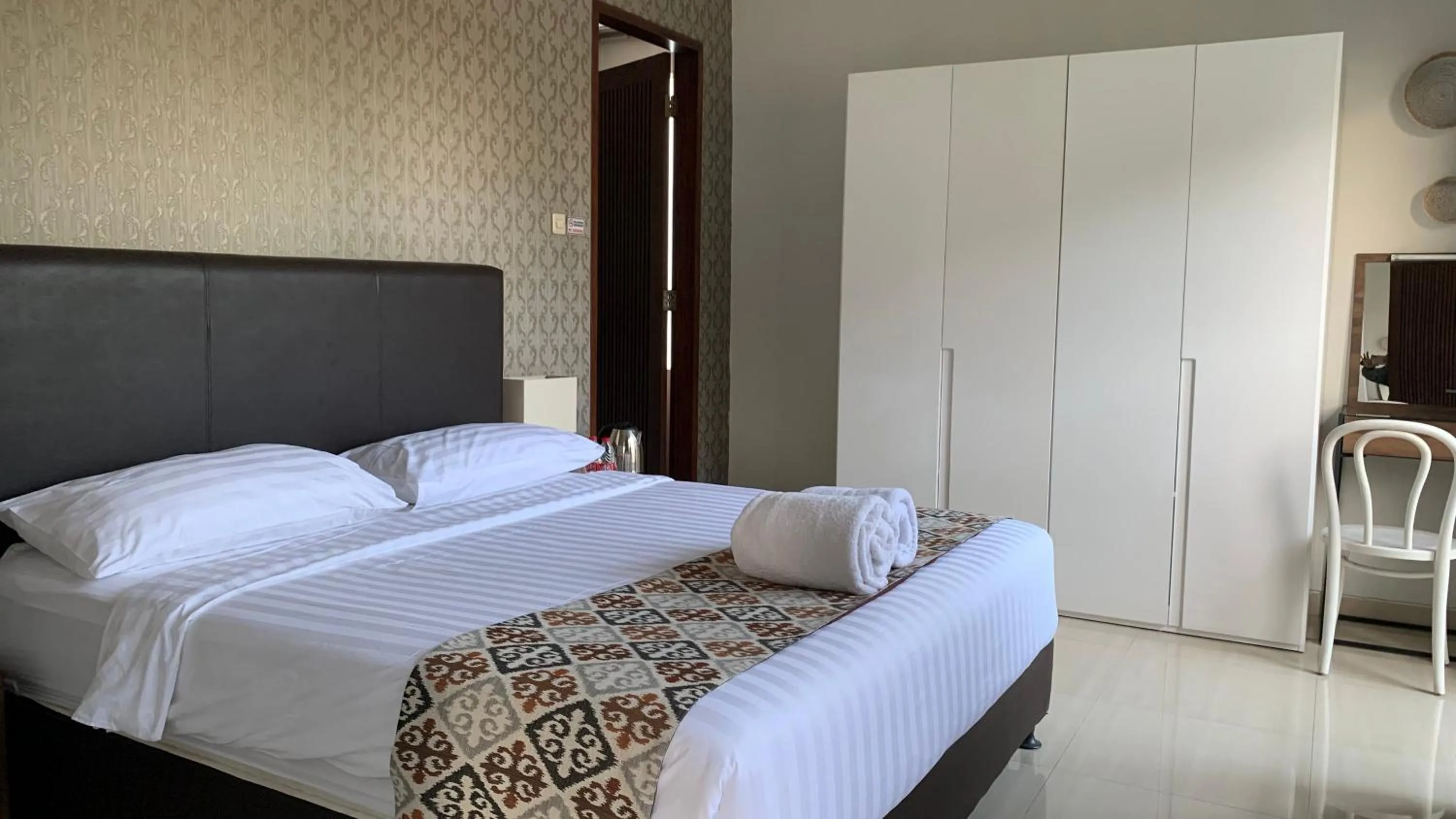 Bed in The BALIem Villa