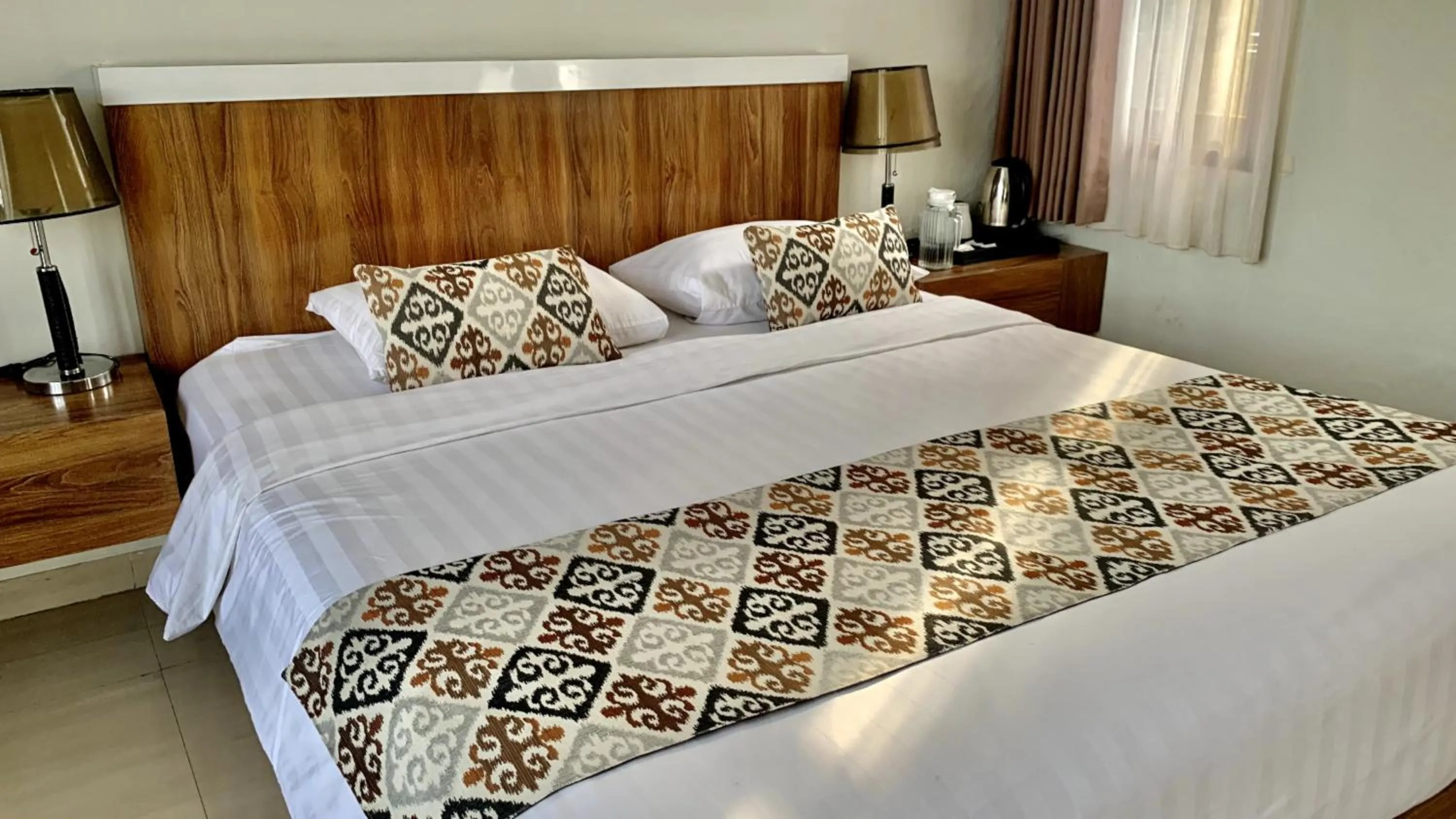 Bed in The BALIem Villa