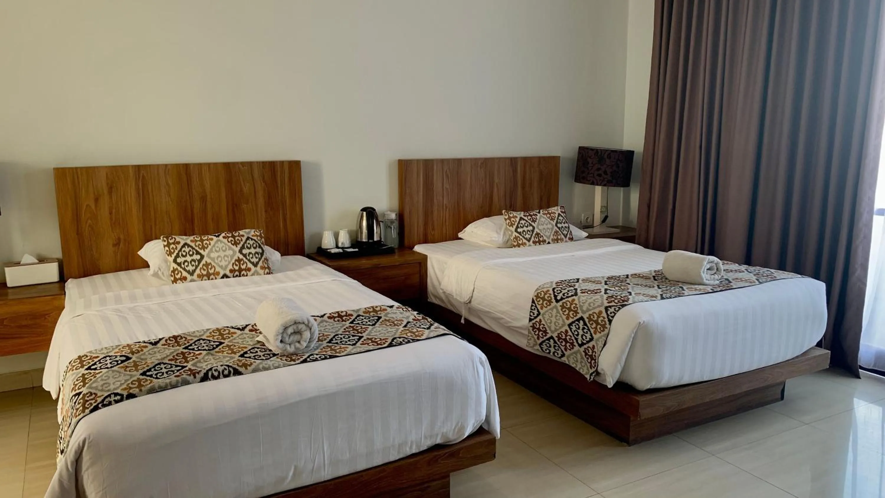 Bed in The BALIem Villa