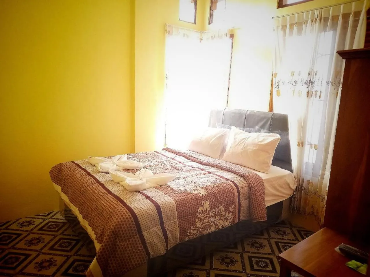 Bed in FIFAWIND HOTEL