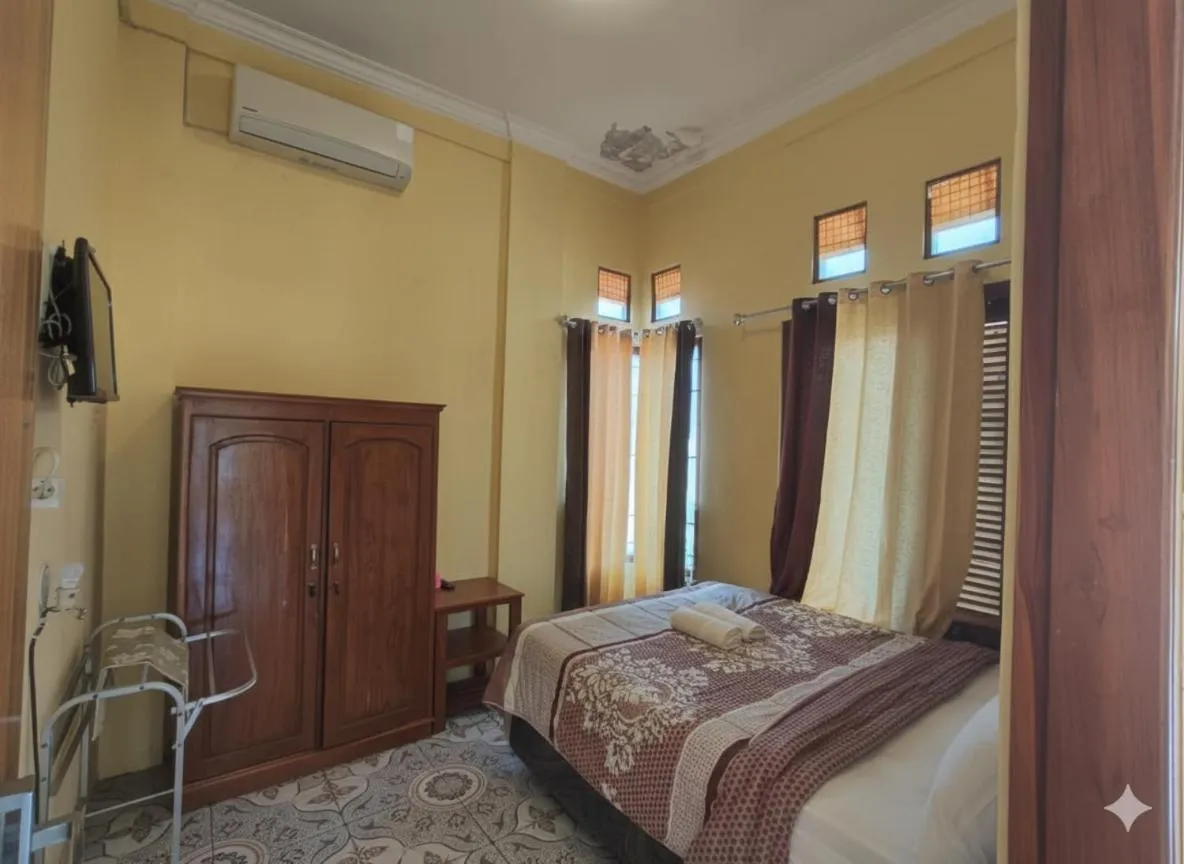 Bed in FIFAWIND HOTEL