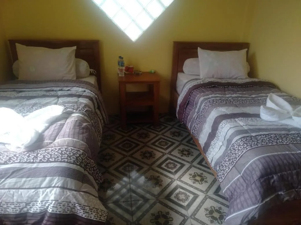 Bed in FIFAWIND HOTEL