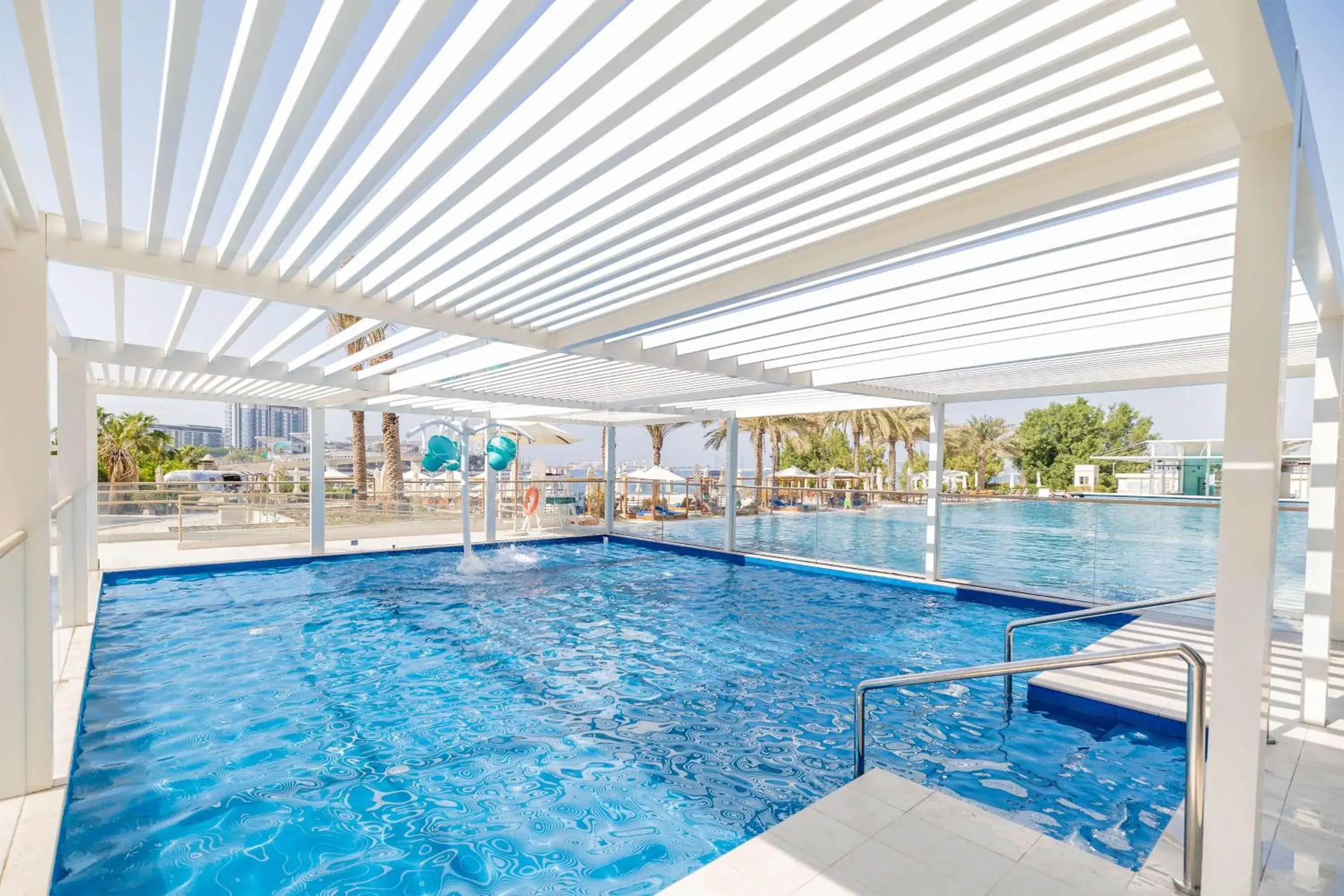 Pool view in DoubleTree by Hilton Dubai Jumeirah Beach Pool view in DoubleTree by Hilton Dubai Jumeirah Beach