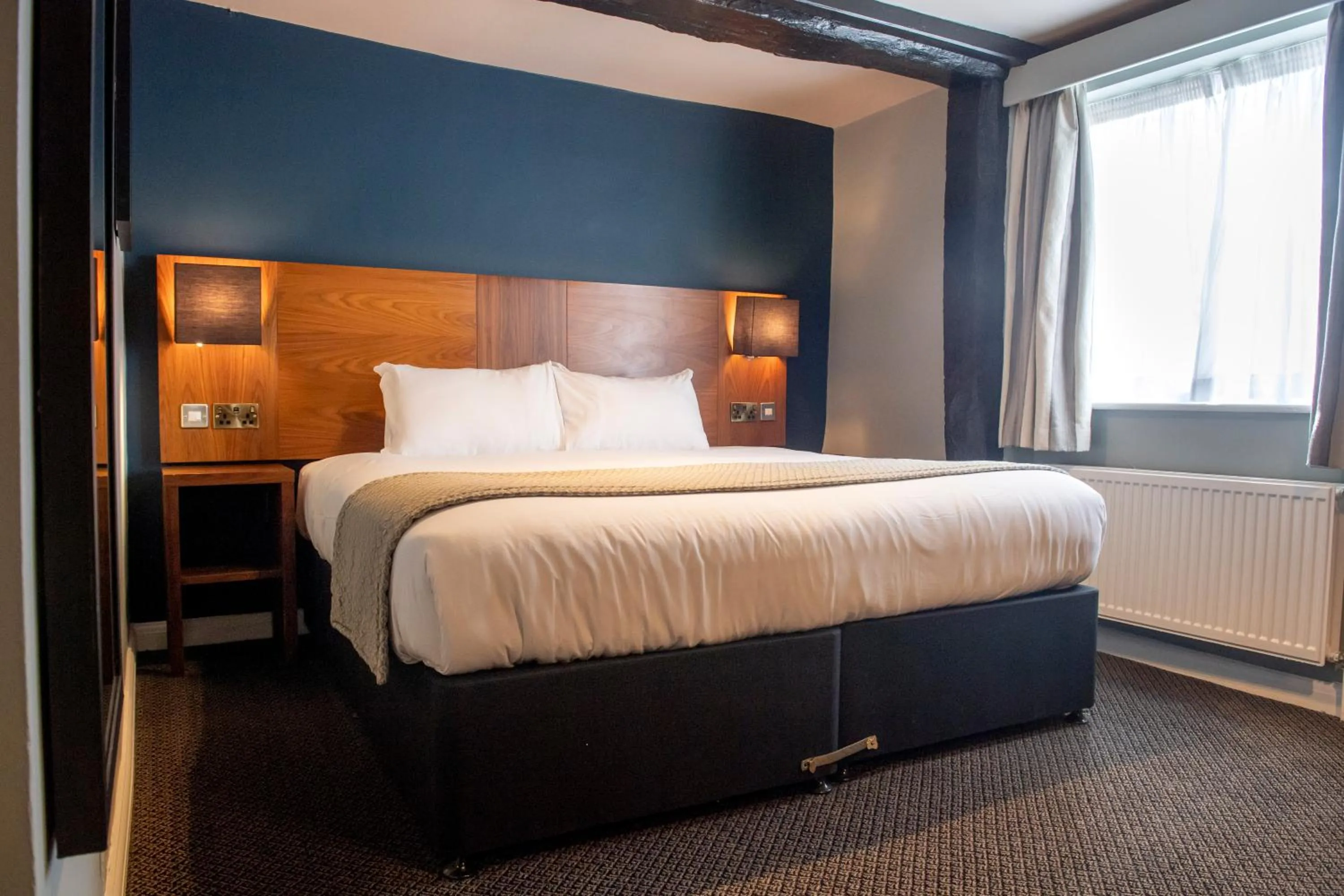 Bed in The White Hart by Innkeeper's Collection