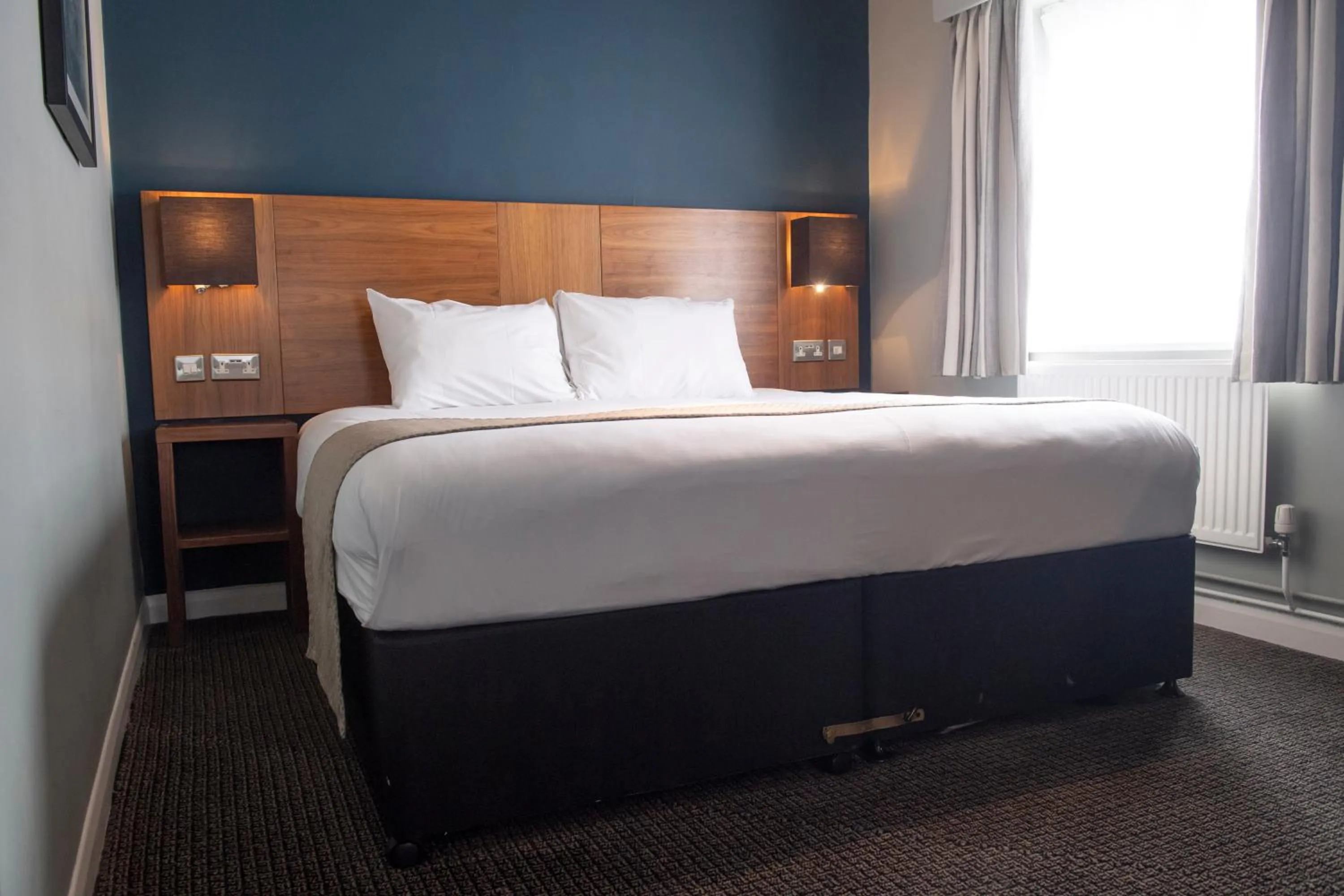 Bed in The White Hart by Innkeeper's Collection