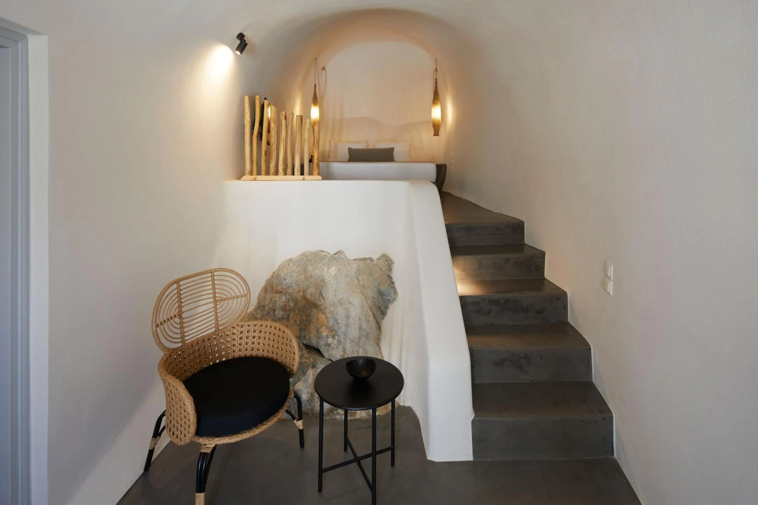 Bed in Arxegono Cave Houses Santorini