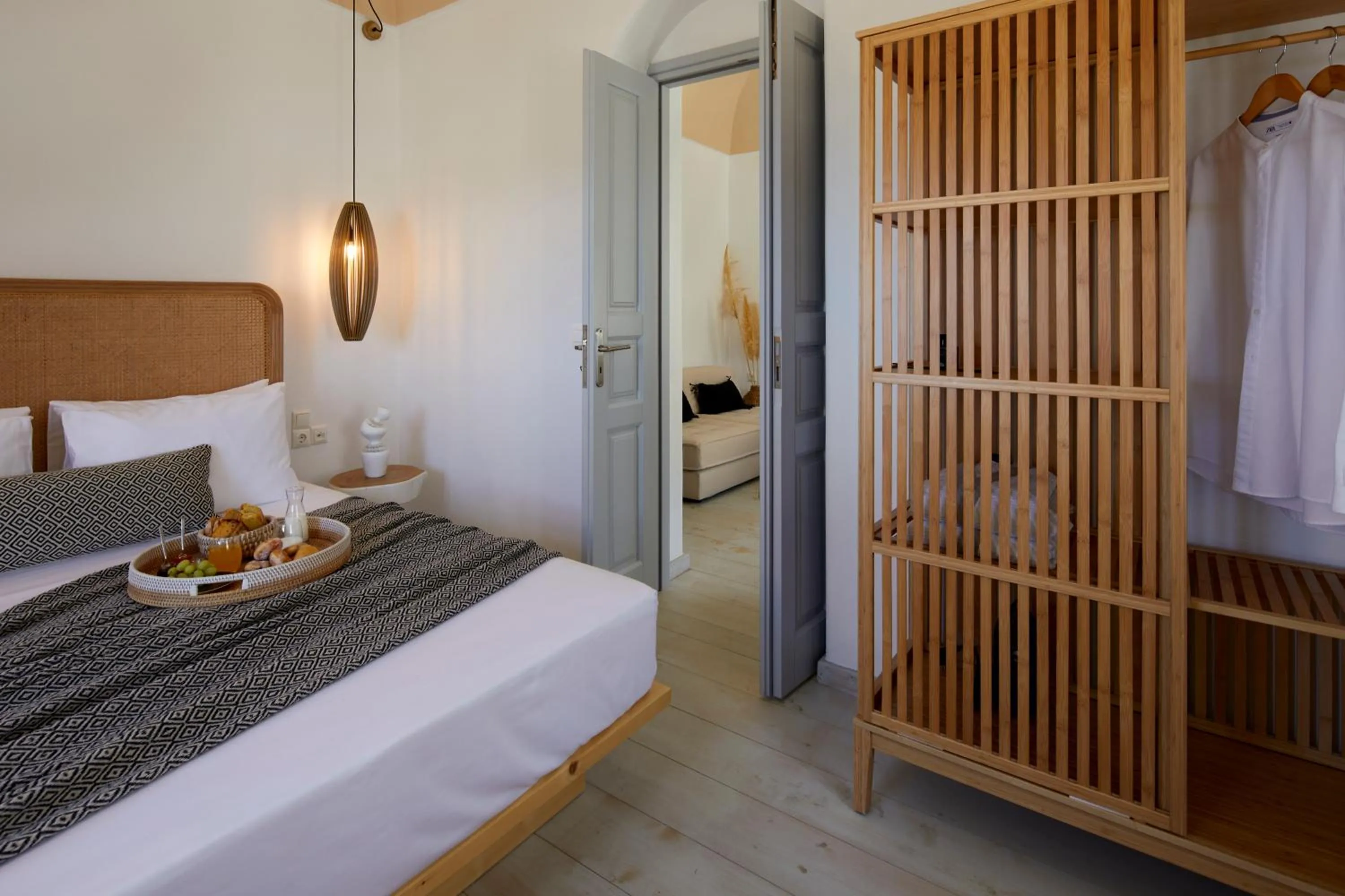 Photo of the whole room, Bed in Arxegono Cave Houses Santorini