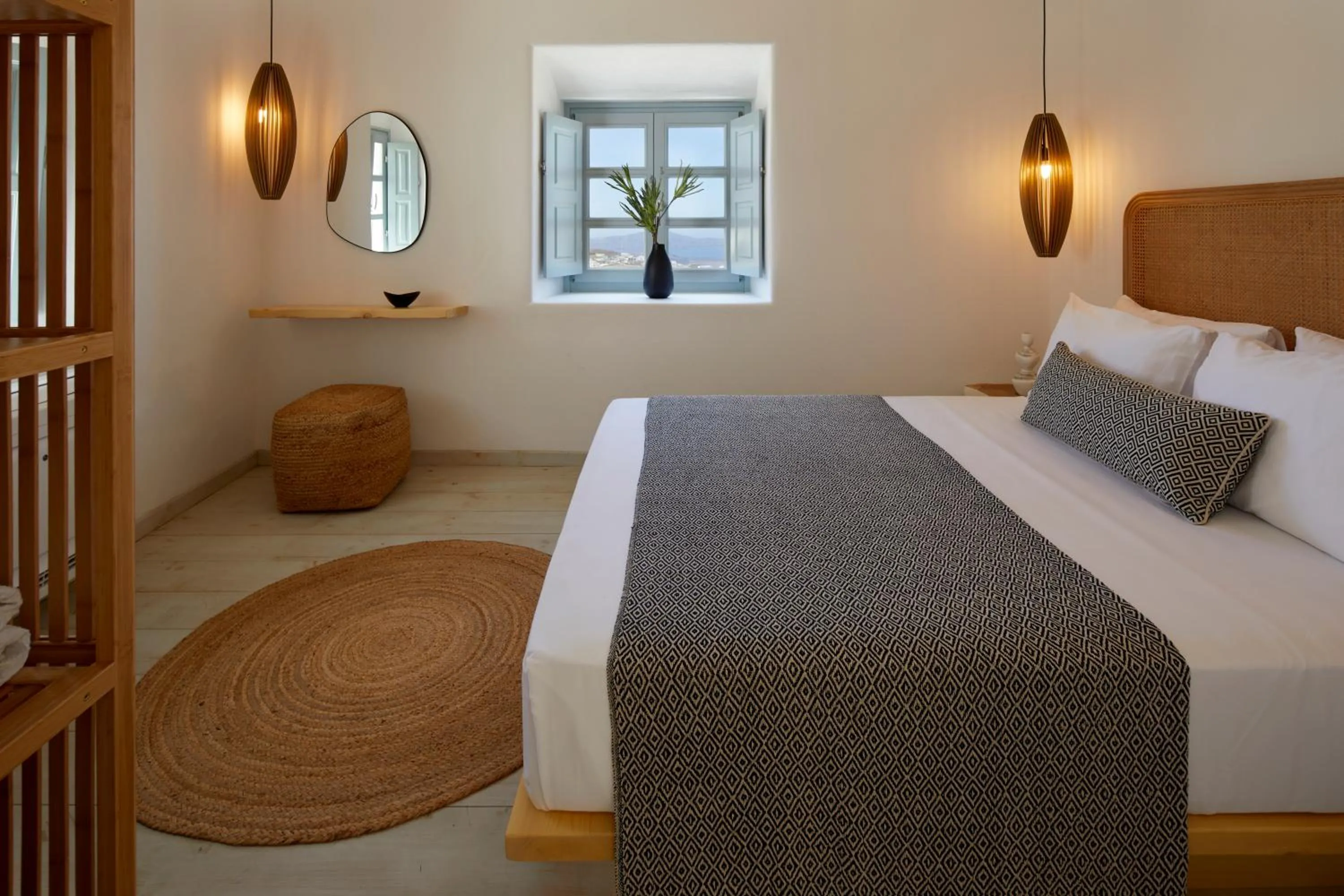 Bed in Arxegono Cave Houses Santorini