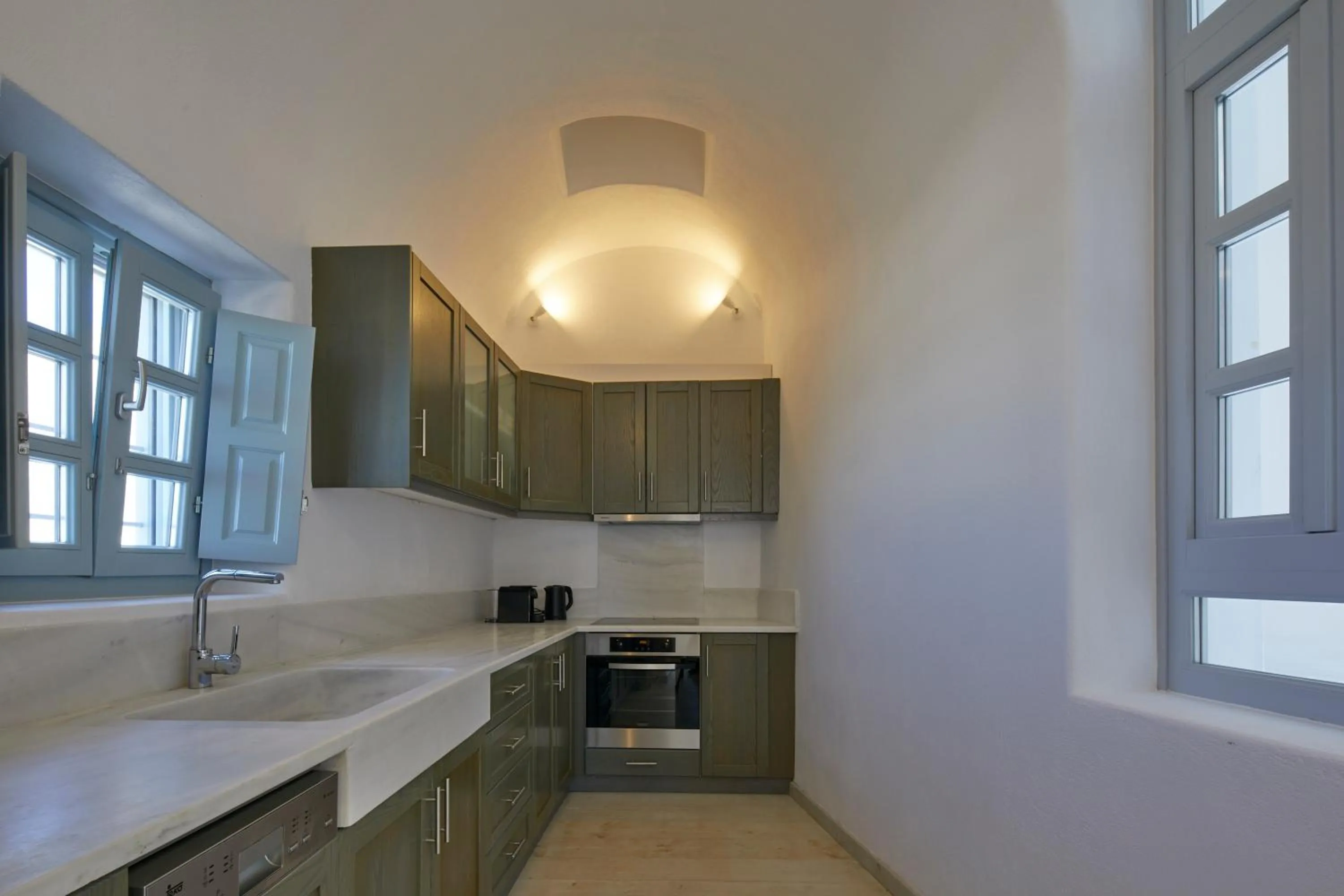 Kitchen or kitchenette in Arxegono Cave Houses Santorini