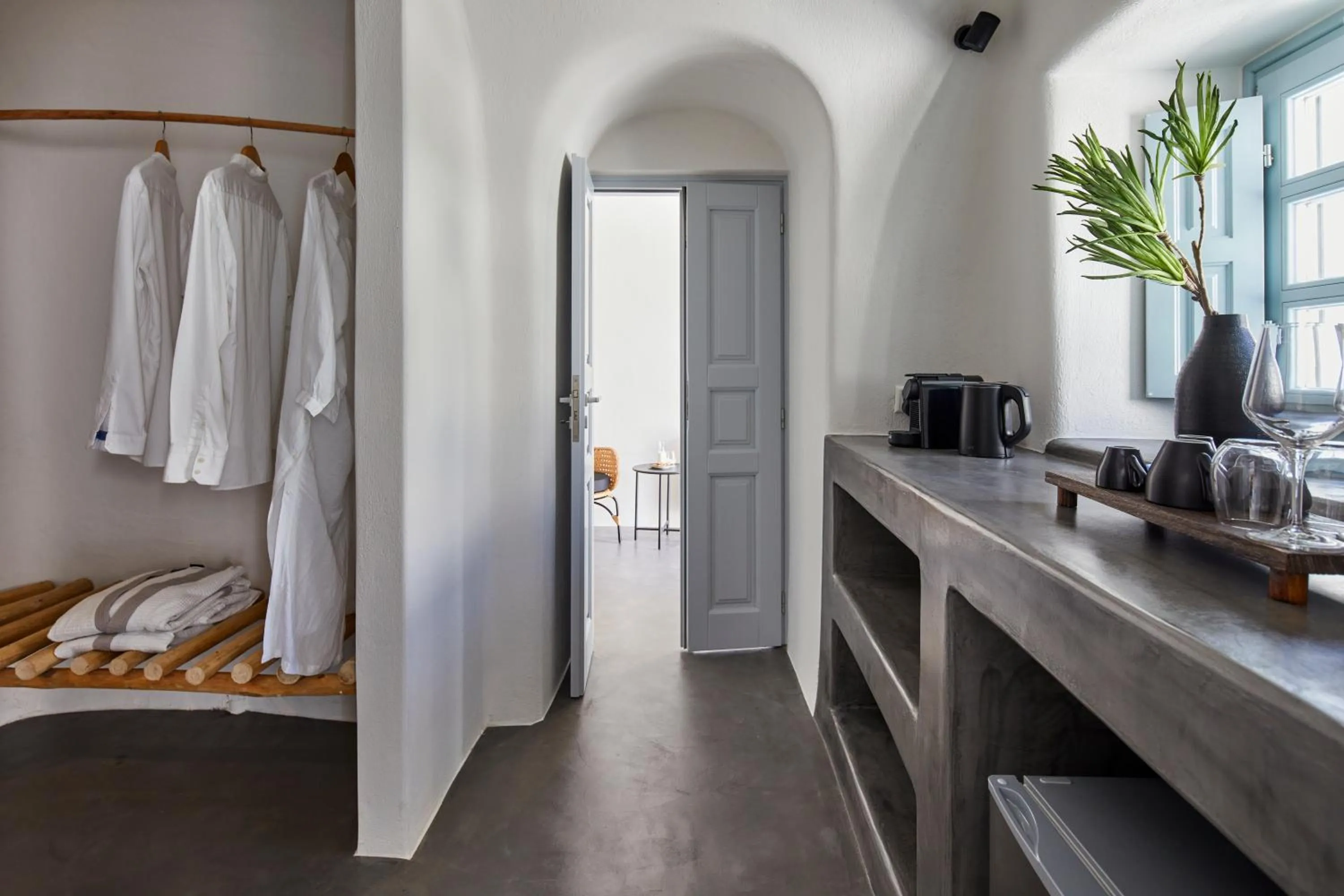 Photo of the whole room, Bed in Arxegono Cave Houses Santorini