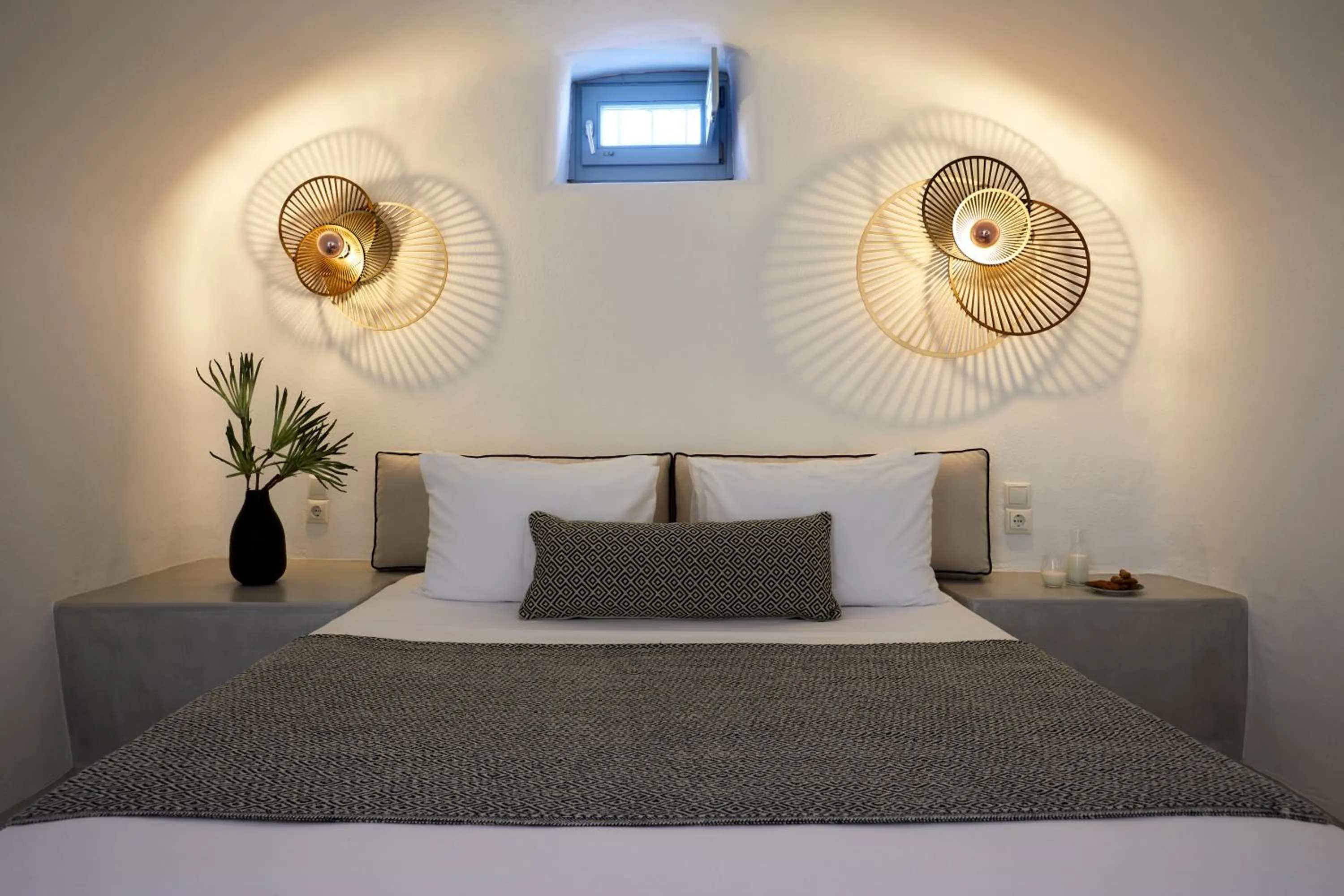 Bed in Arxegono Cave Houses Santorini