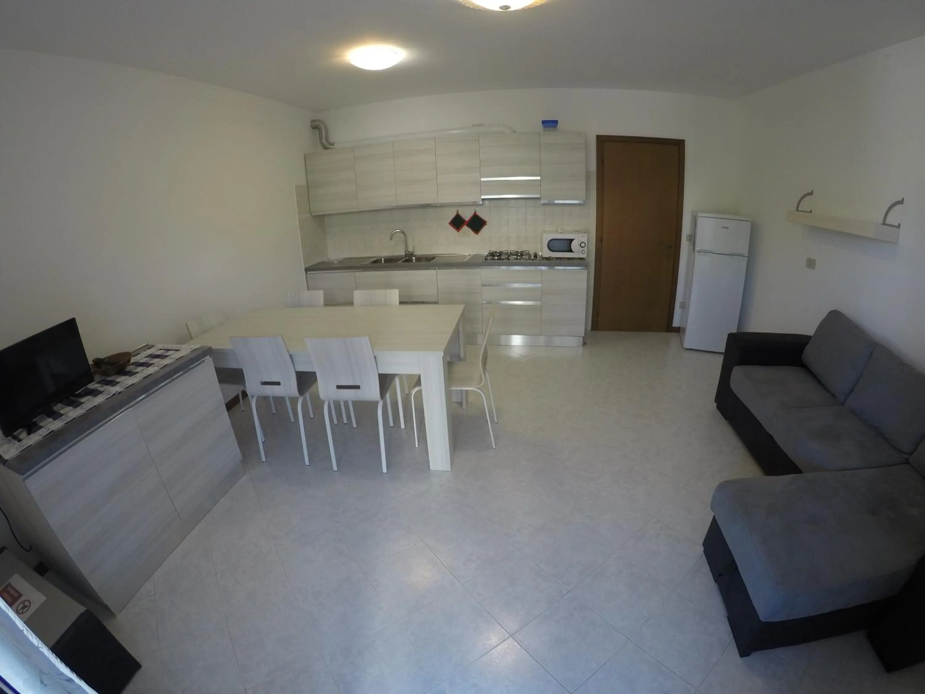 Kitchen or kitchenette in Villaggio Cristina 2 - Agenzia Cocal