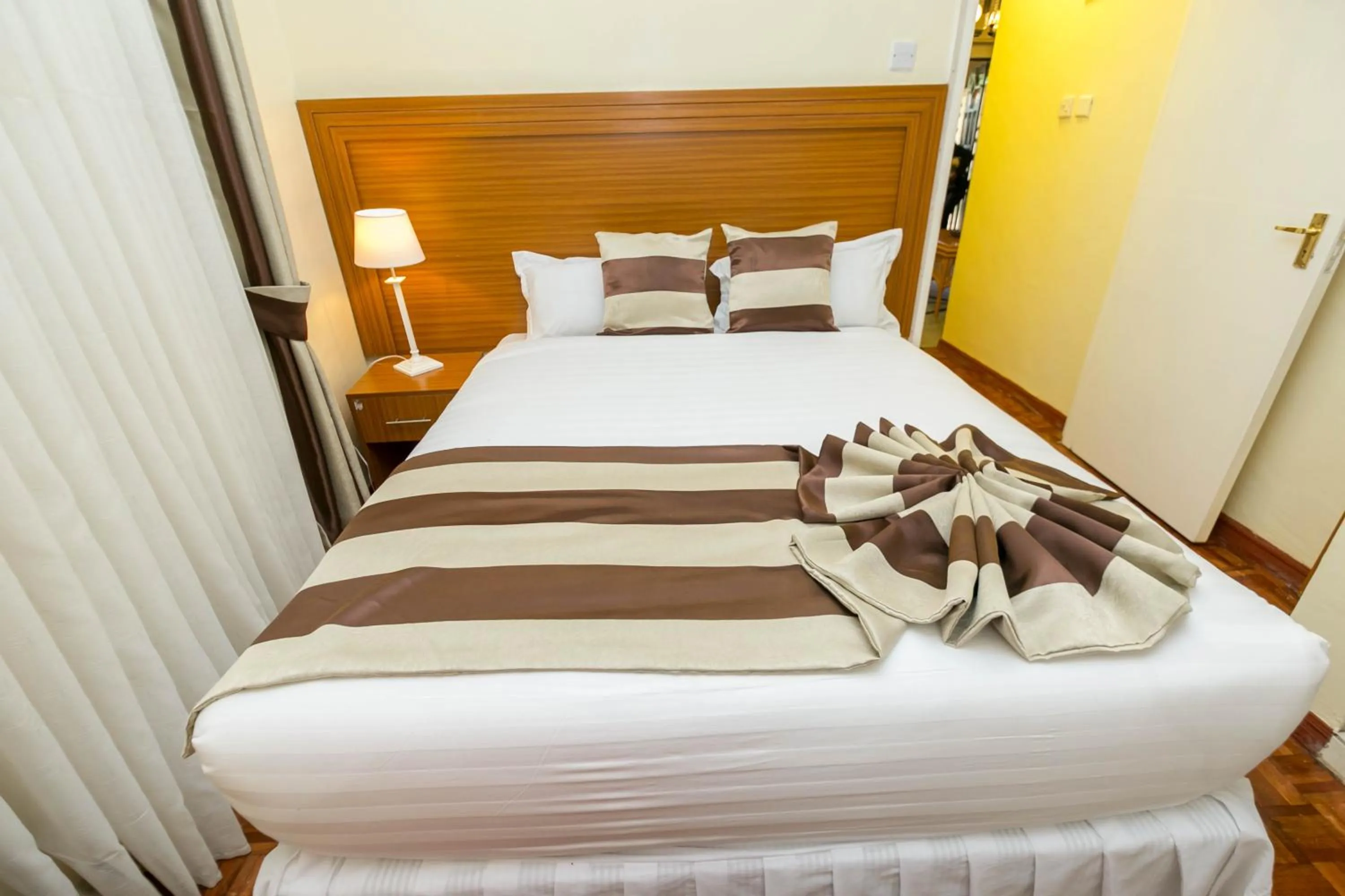 Bed in Fahari Gardens Hotel