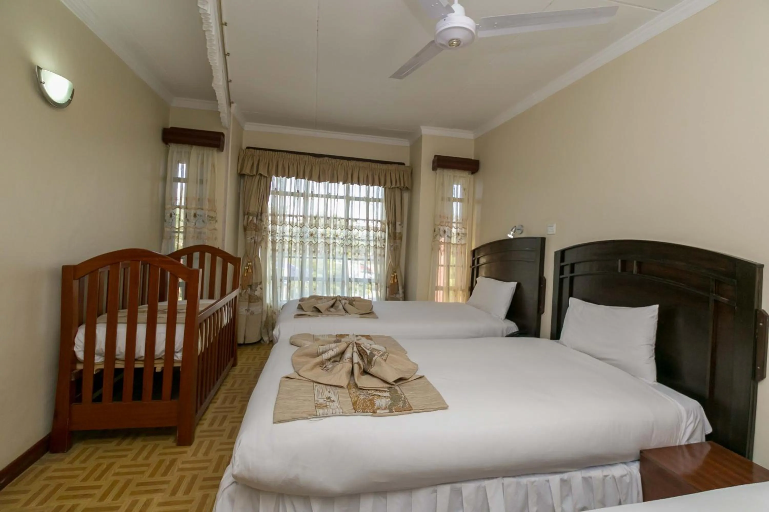 Photo of the whole room, Bed in Fahari Gardens Hotel