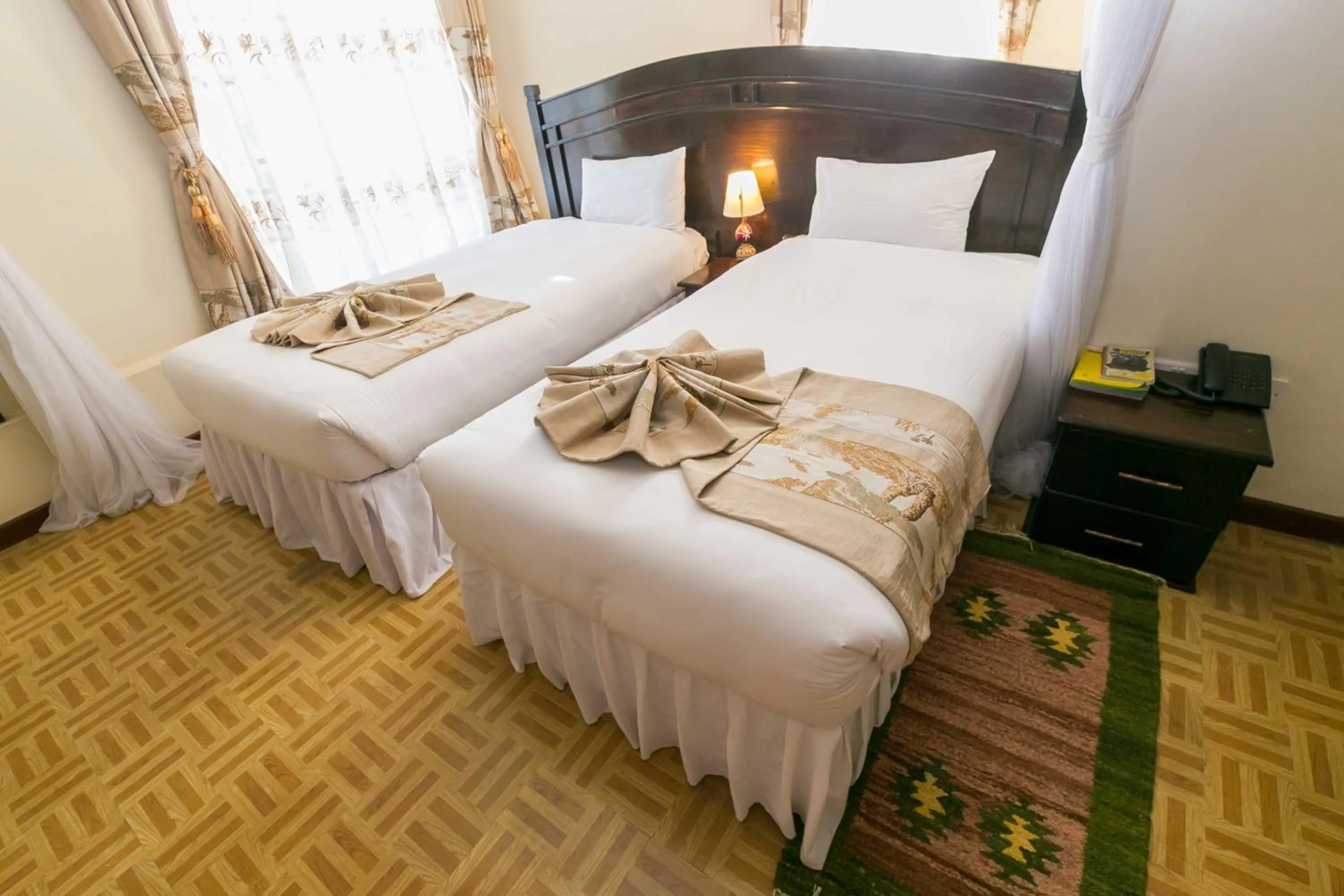 Photo of the whole room, Bed in Fahari Gardens Hotel