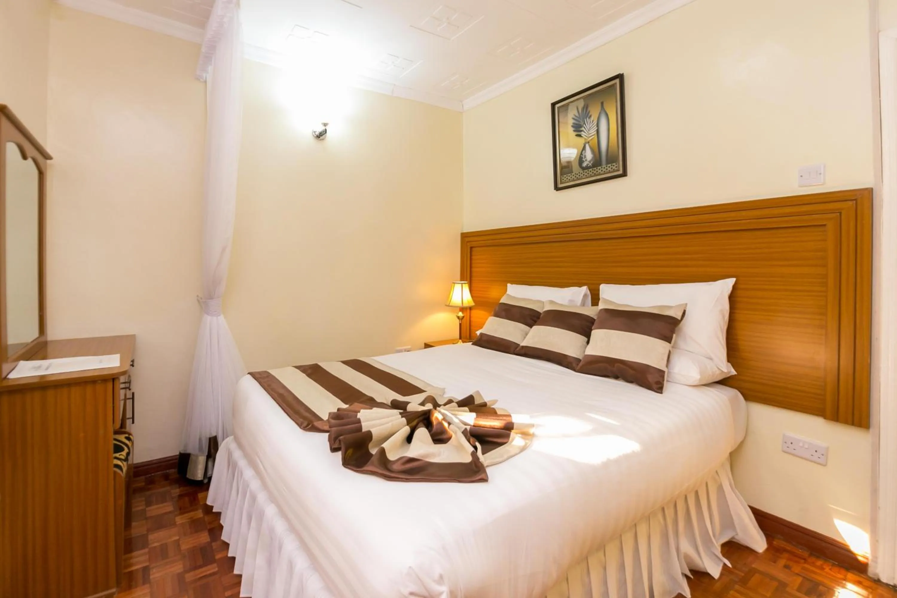 Bedroom, Bed in Fahari Gardens Hotel