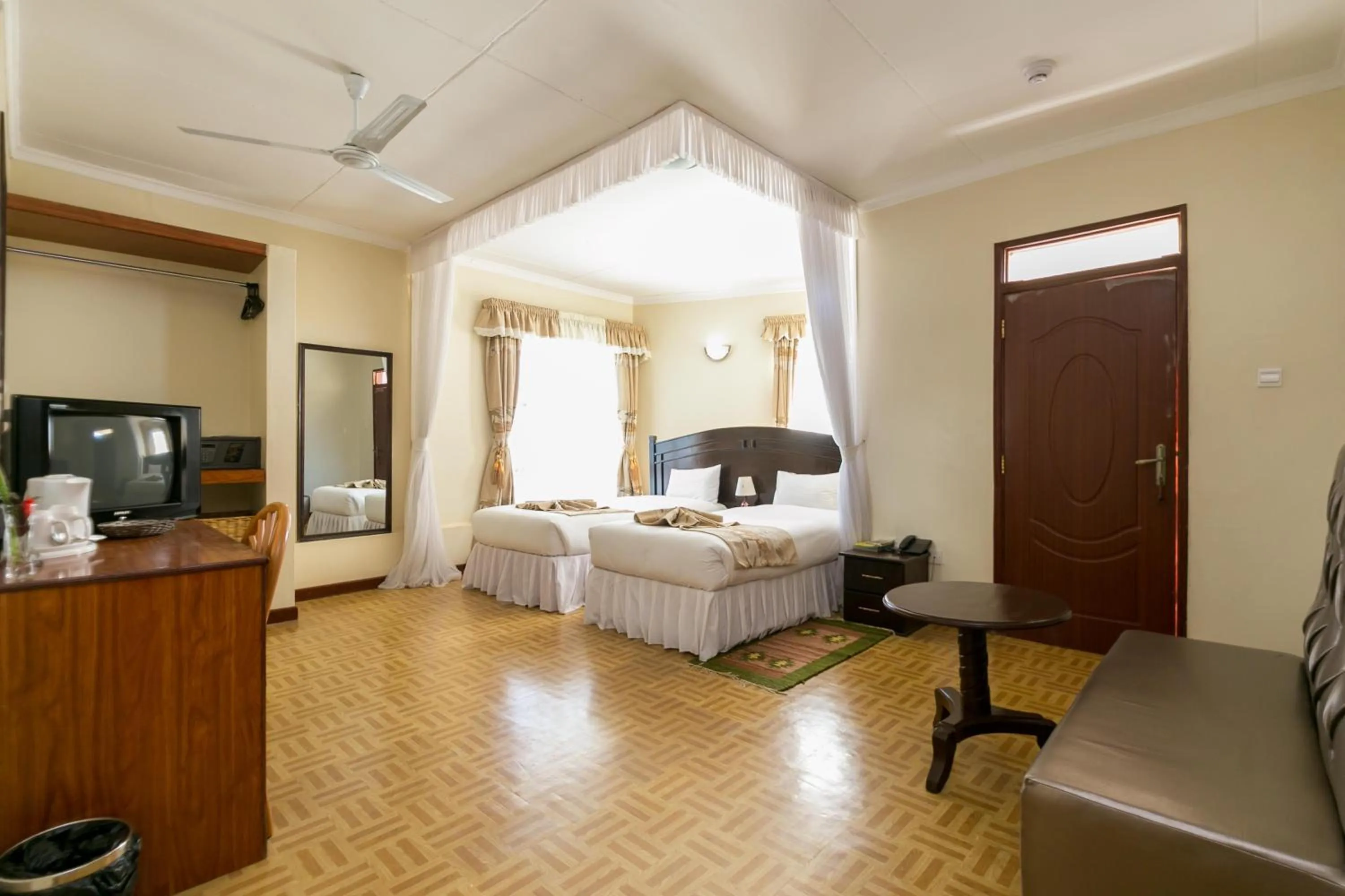 Photo of the whole room, Bed in Fahari Gardens Hotel