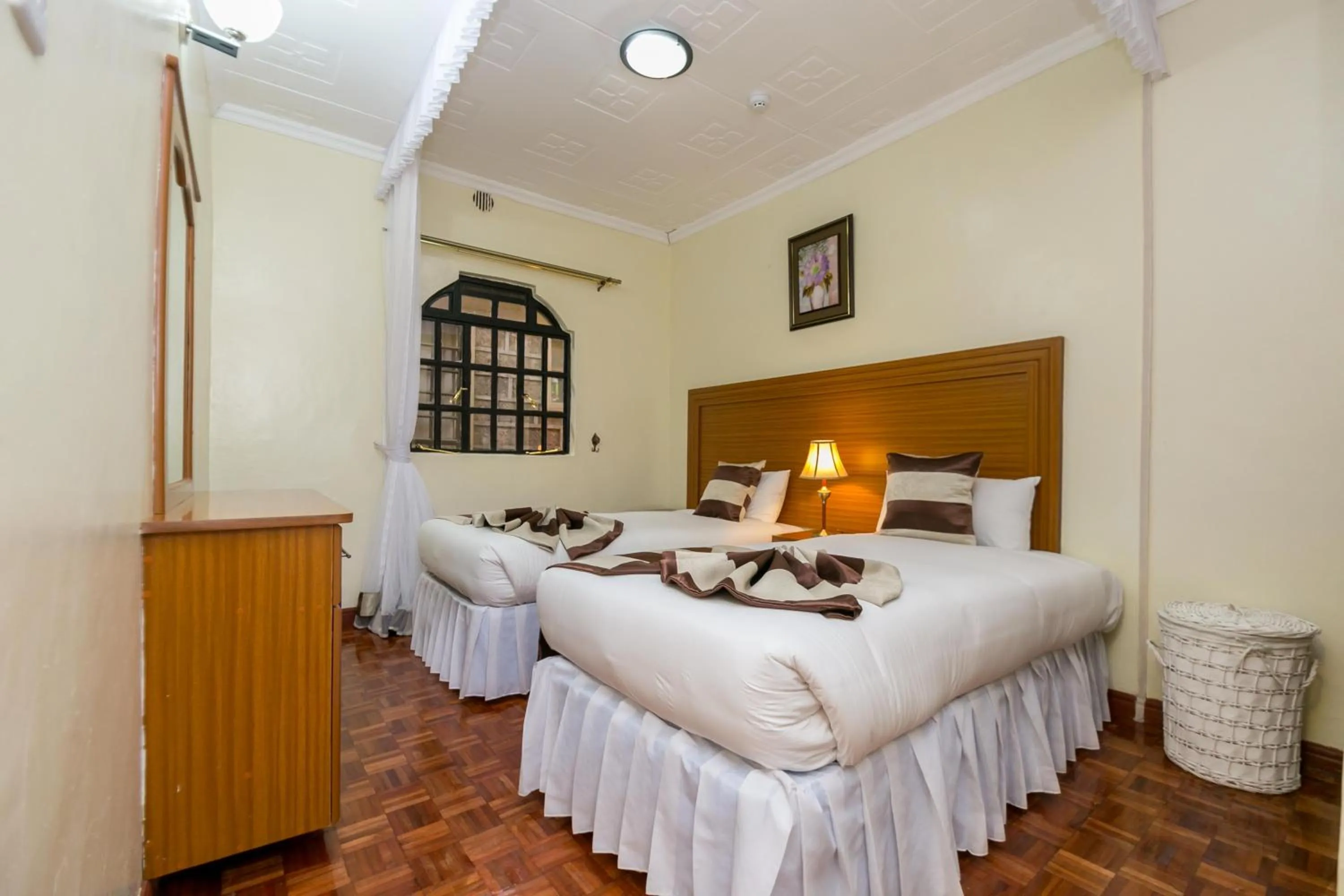 Bed in Fahari Gardens Hotel