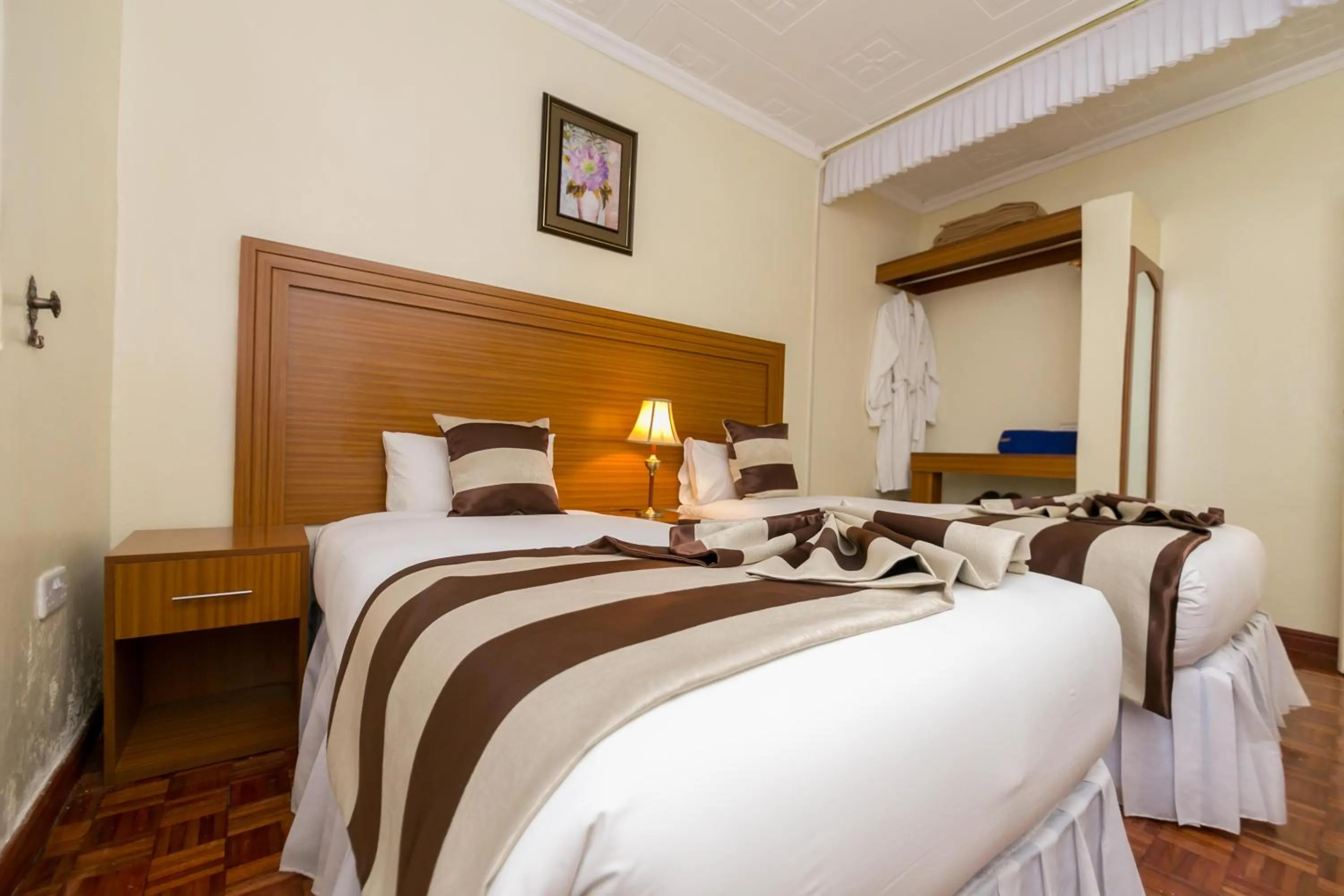 Bedroom, Bed in Fahari Gardens Hotel