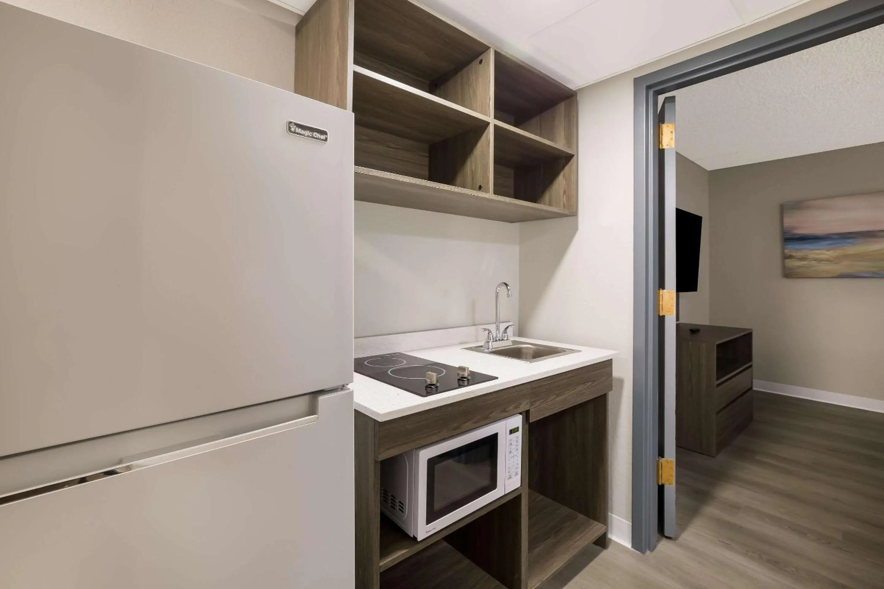 Bedroom in Suburban Studios Milwaukee Airport