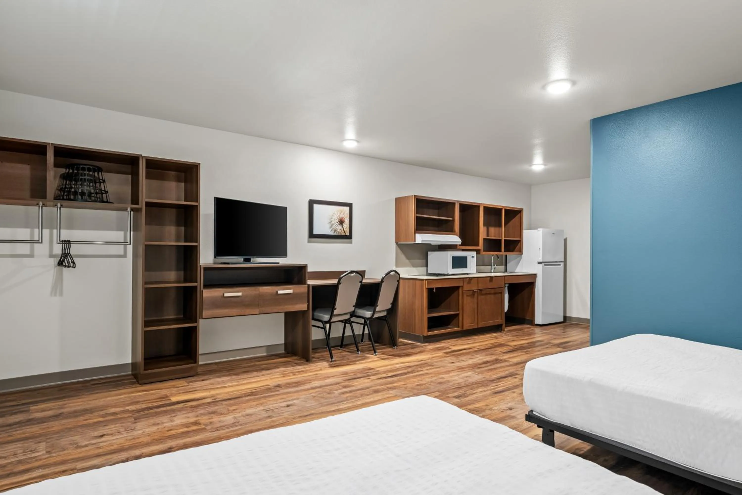 Bed in WoodSpring Suites Orlando East UCF