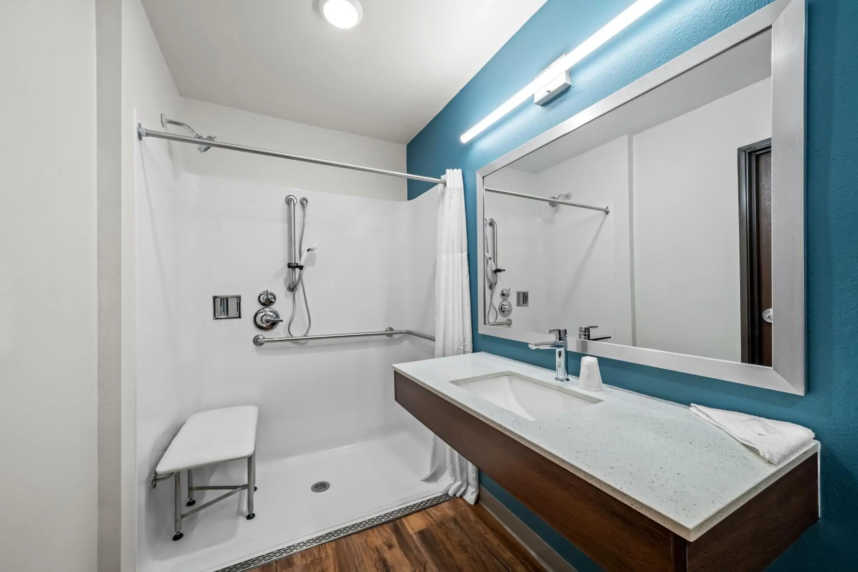 King Suite with Roll-In Shower - Disability Access/Non Smoking in WoodSpring Suites Orlando East UCF King Suite with Roll-In Shower - Disability Access/Non Smoking in WoodSpring Suites Orlando East UCF