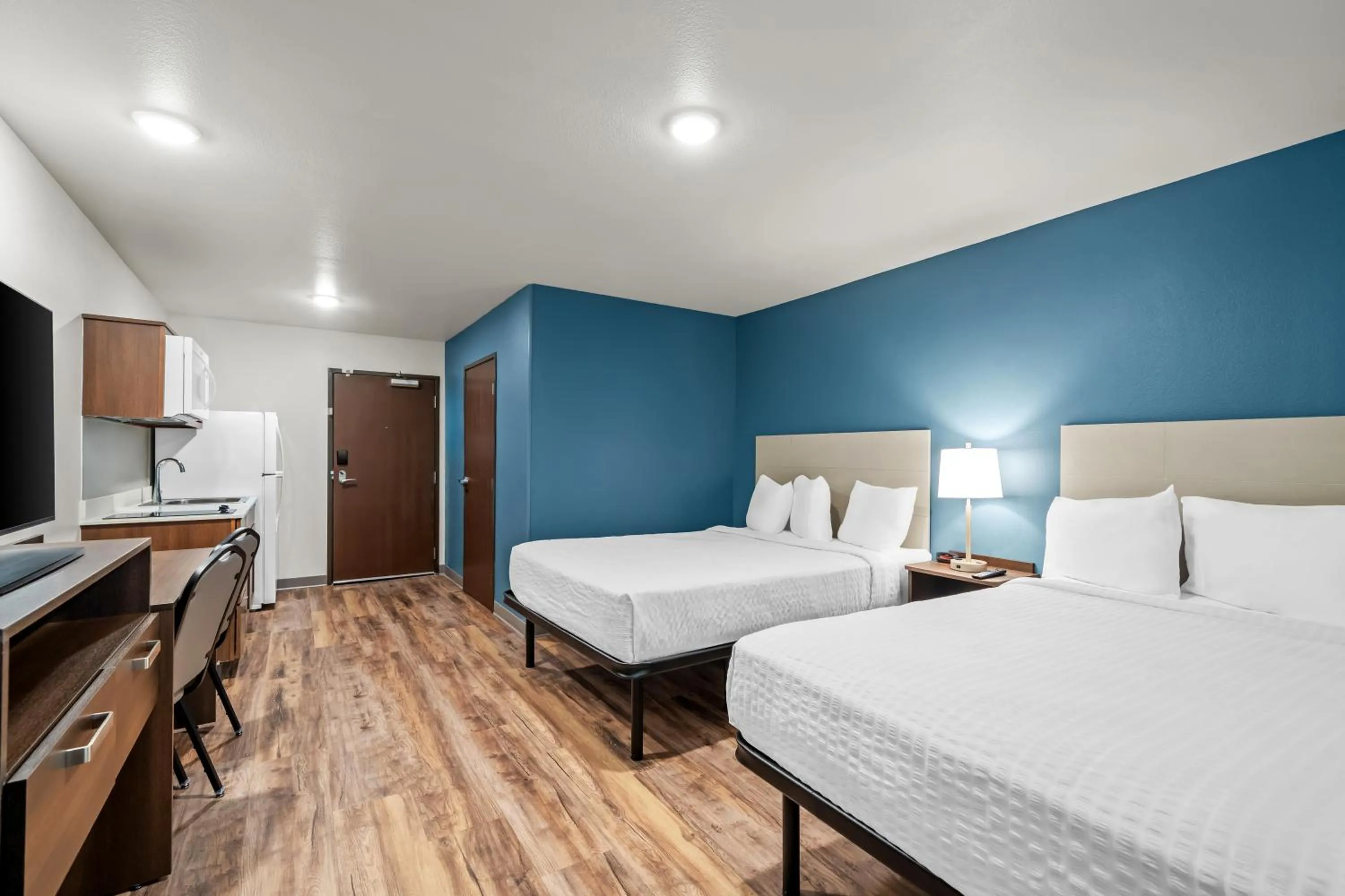 Bed in WoodSpring Suites Orlando East UCF