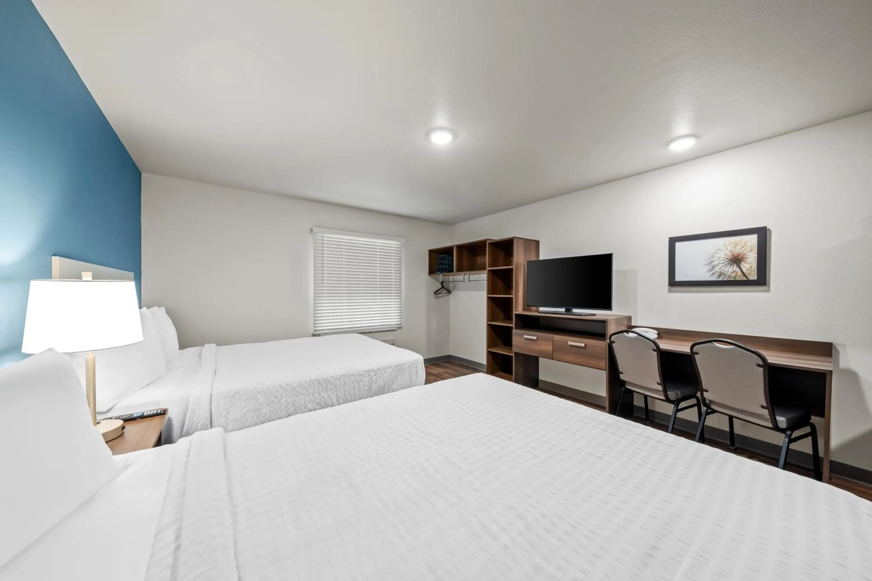 Bed in WoodSpring Suites Orlando East UCF