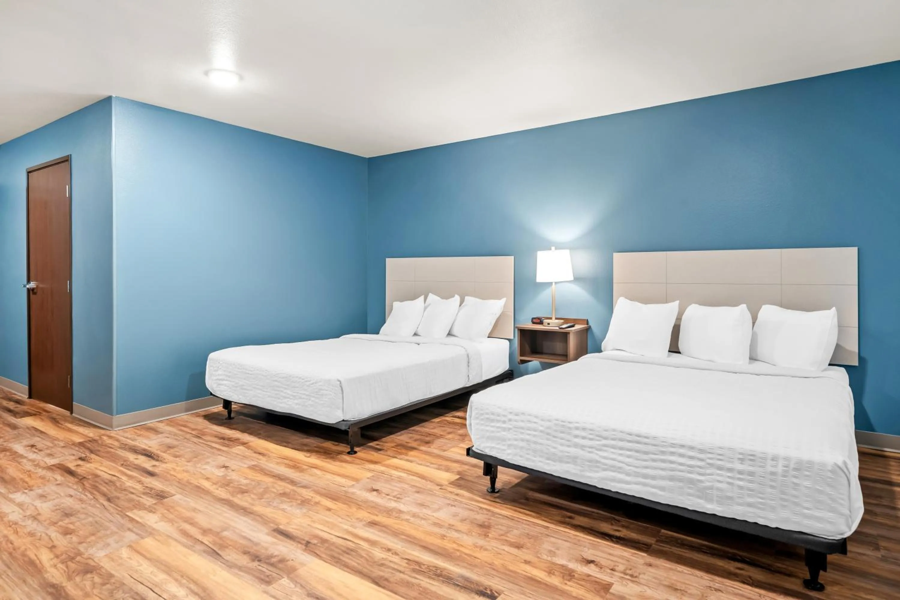 Bed in WoodSpring Suites Orlando East UCF