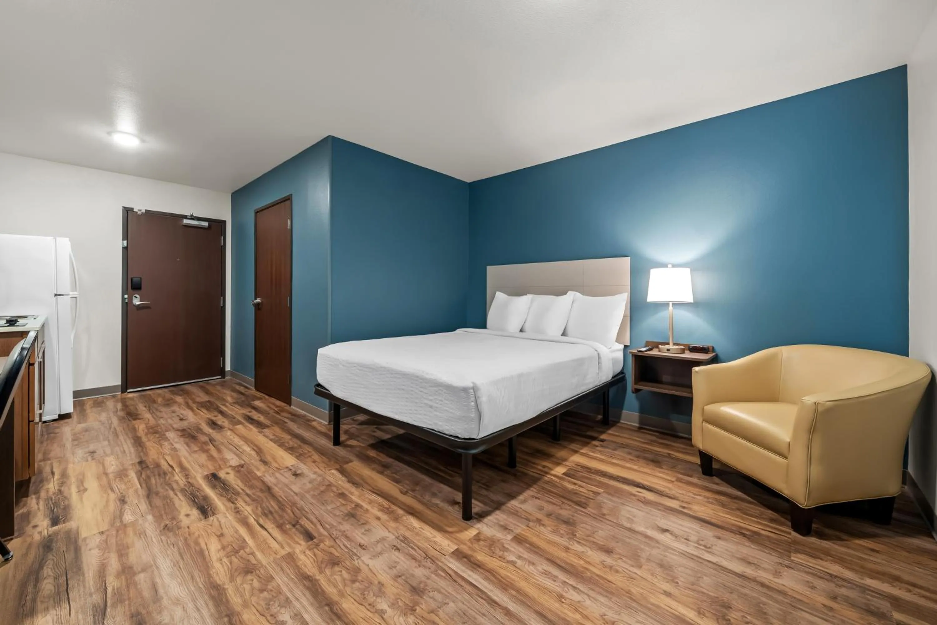 Bed in WoodSpring Suites Orlando East UCF